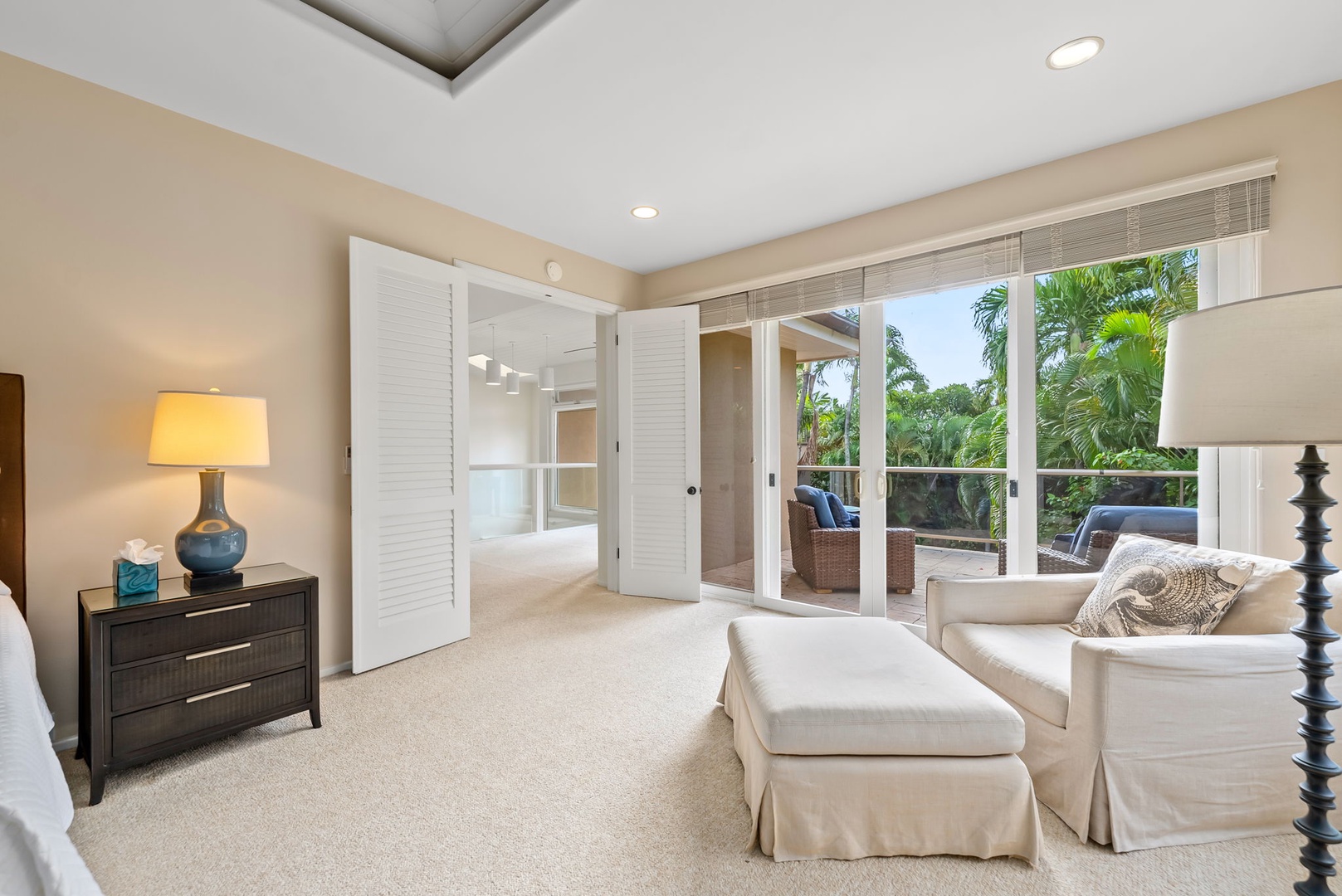 Honolulu Vacation Rentals, Diamond Head Luxe - Unwind in your elegant suite with tropical garden views and direct balcony access to outdoor seating.