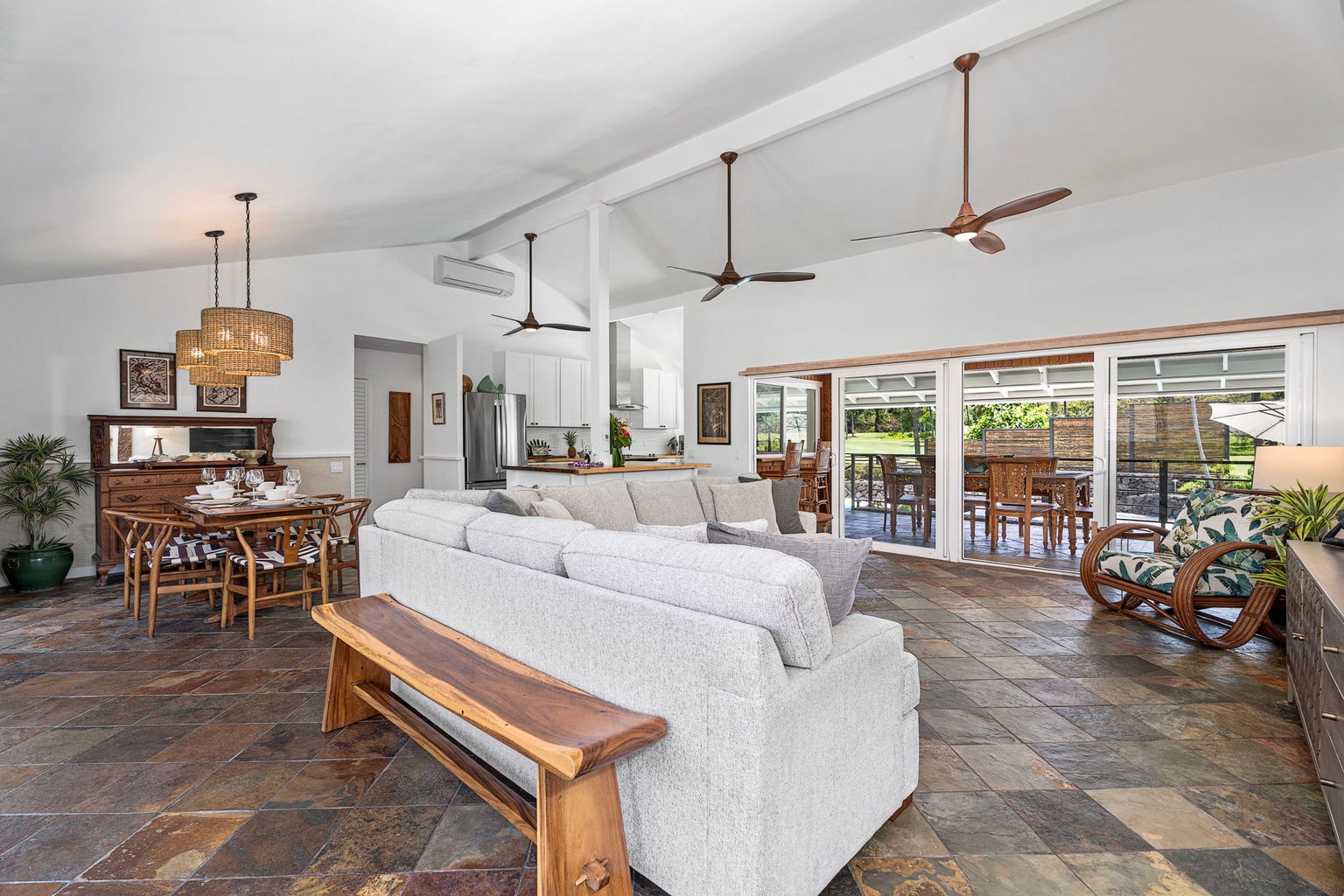 Kailua Kona Vacation Rentals, Manukai Hale - Vaulted ceilings rise over a living area built around the sectional and the Smart TV.
