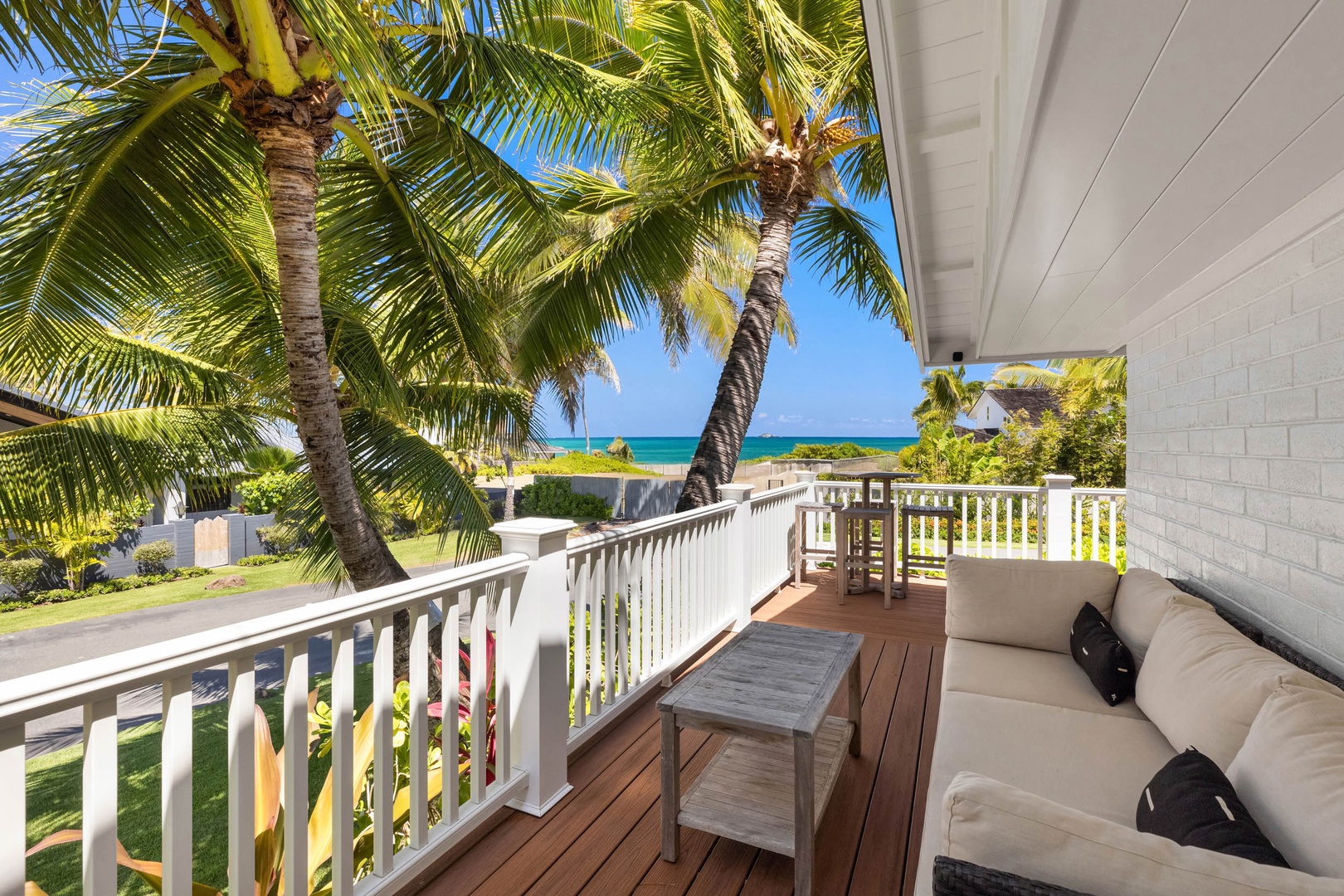 Kailua Vacation Rentals, Ranch Beach Estate - Expansive wrap-around deck for panoramic relaxation.