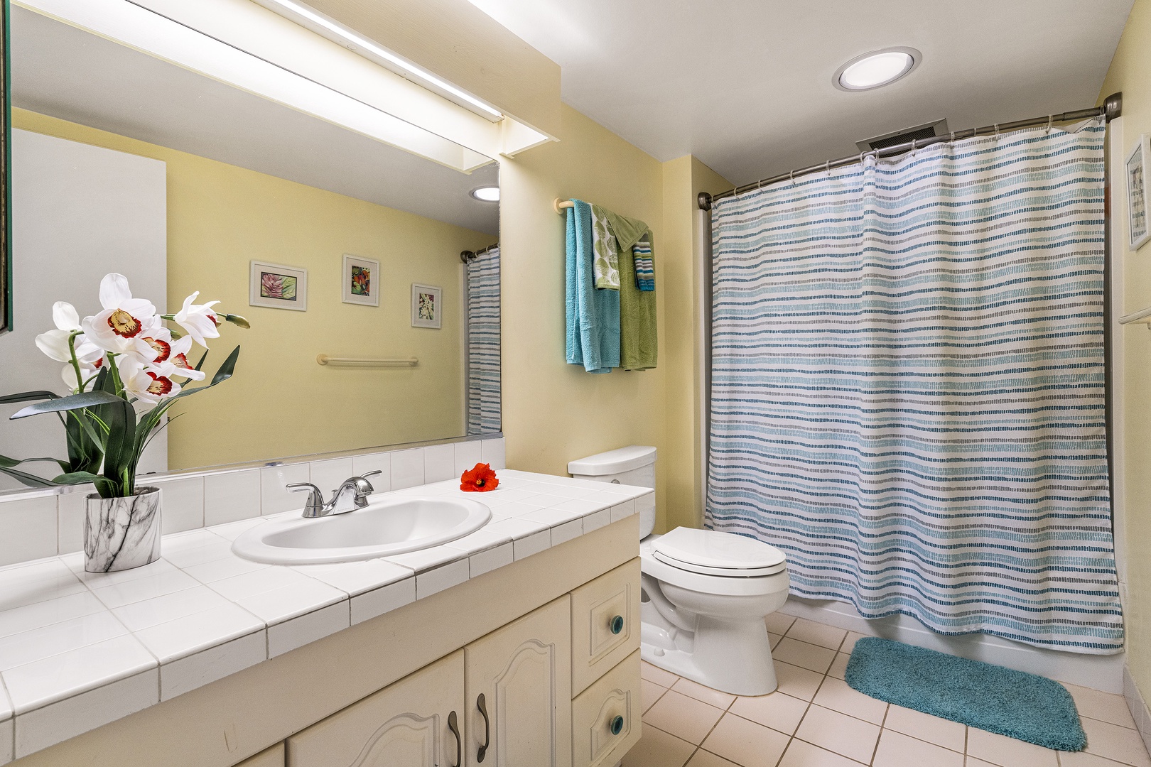 Kailua Kona Vacation Rentals, Kona Makai 2303 - Bathroom featuring a tub/shower combo