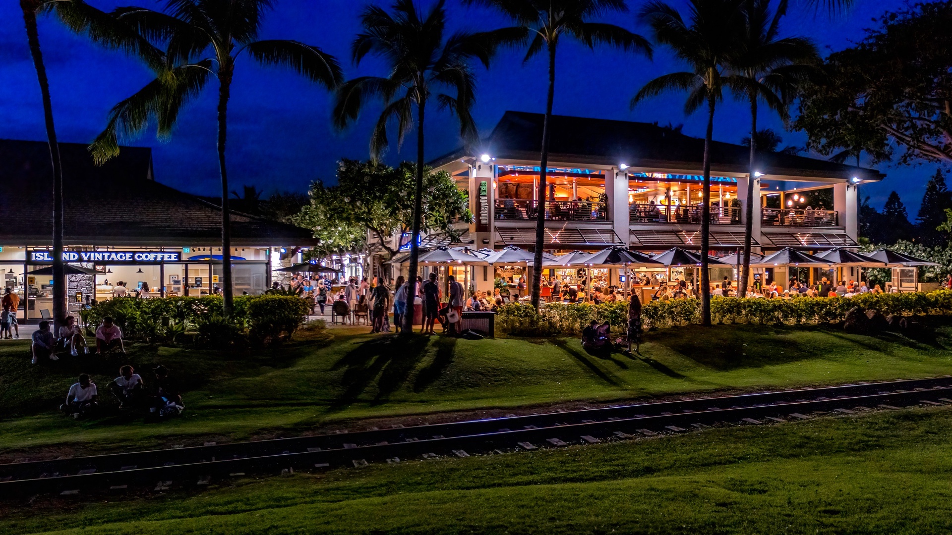 Kapolei Vacation Rentals, Coconut Plantation 1074-1 - The Monkey Pod Kitchen at night.