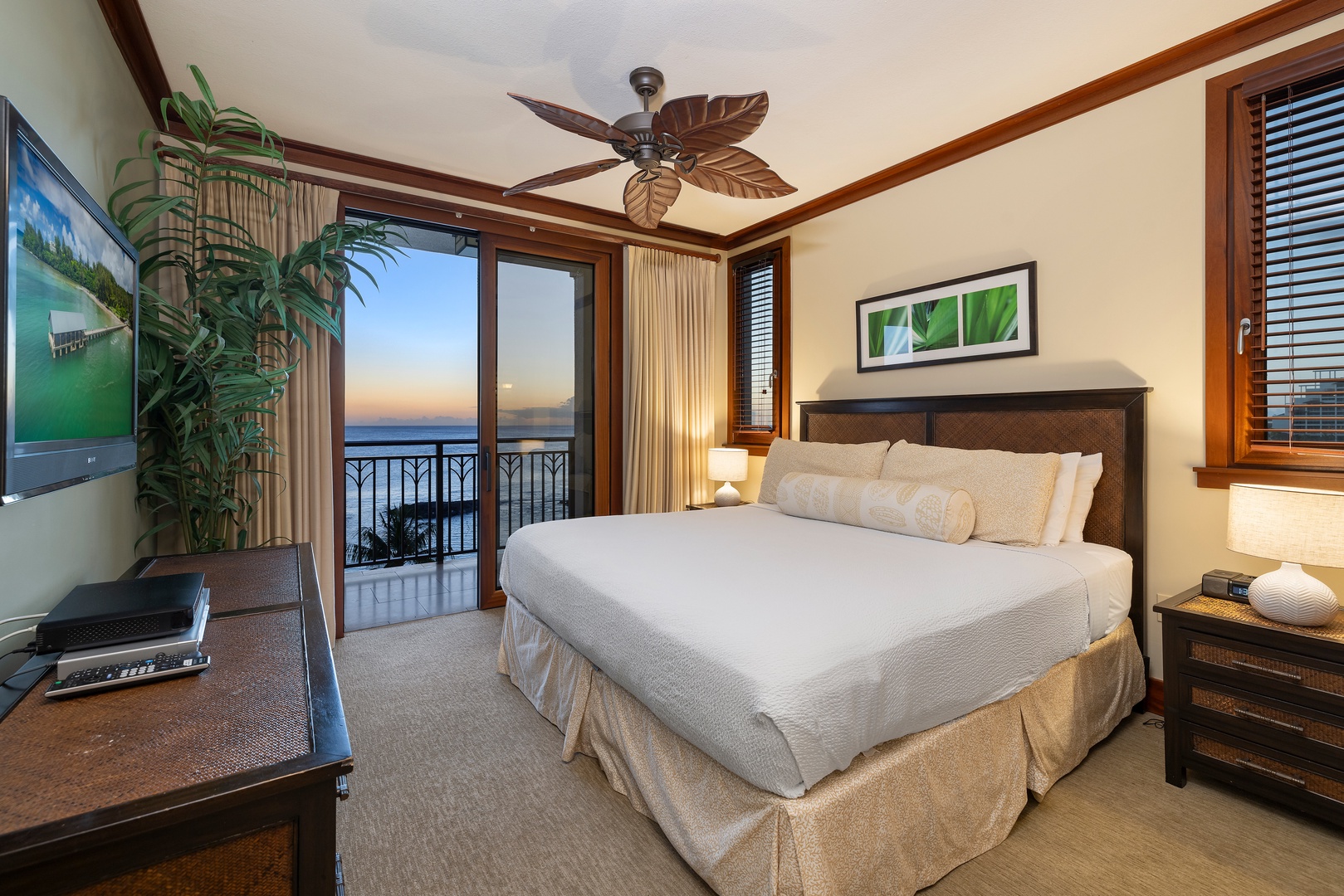 Kapolei Vacation Rentals, Ko Olina Beach Villas B610 - The primary guest bedroom with incredible scenery and a TV.