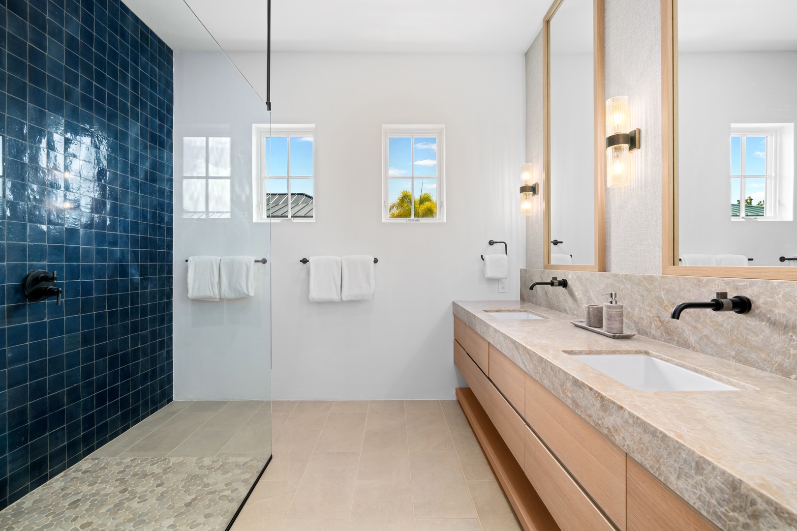 Koloa Vacation Rentals, Makani Kai - Deep navy tile turns the walk-in shower into the bathroom's whole statement.