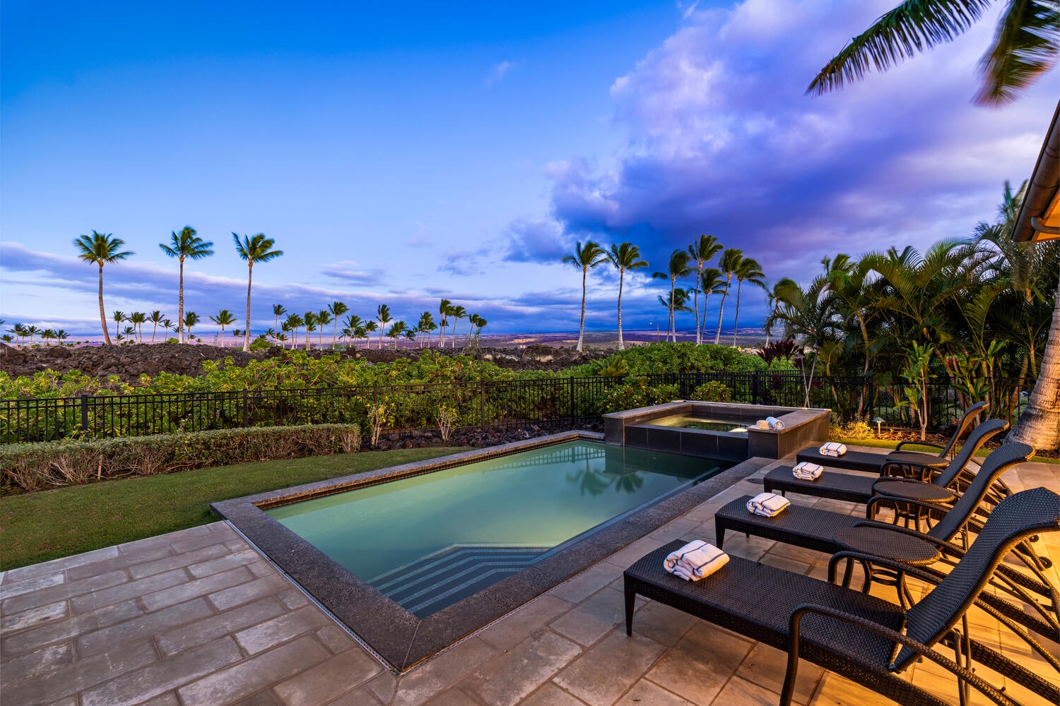 Kamuela Vacation Rentals, Laule'a at the Mauna Lani Resort #14 - Evening views over the pool and golf course offer the perfect twilight backdrop.