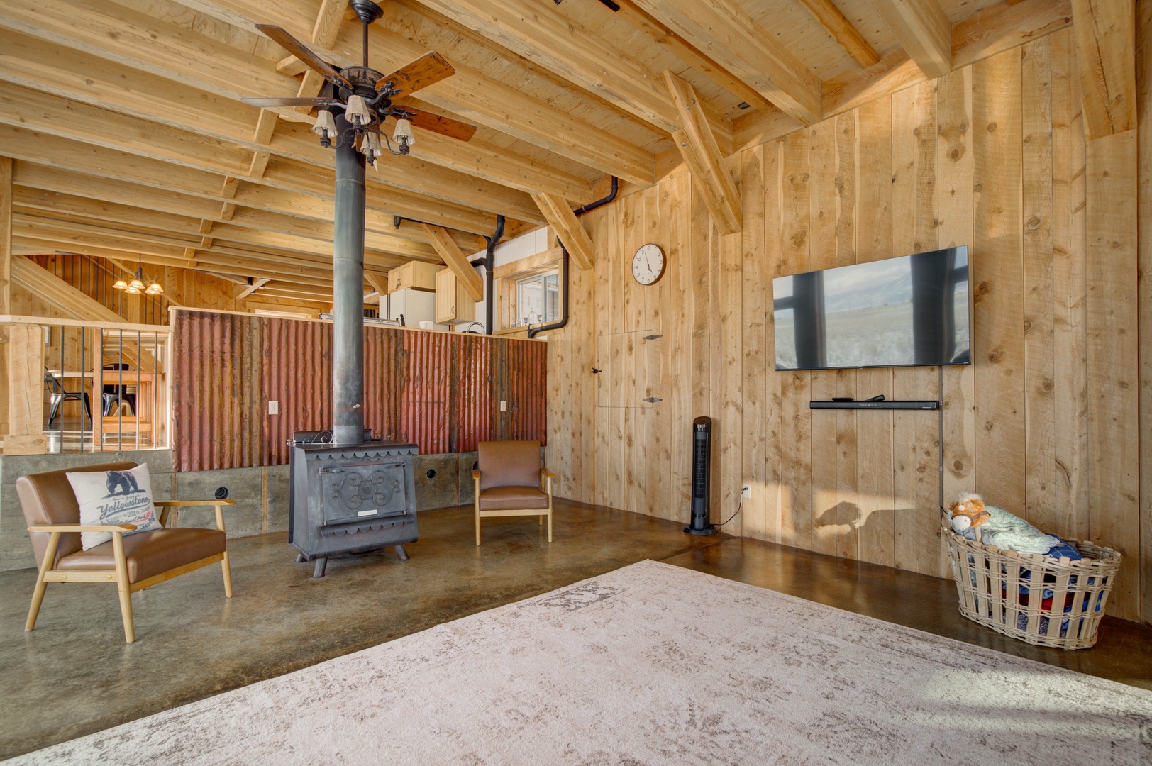Livingston Vacation Rentals, OFB Sunset Grove - Living room with flatscreen tv and cozy wood stove