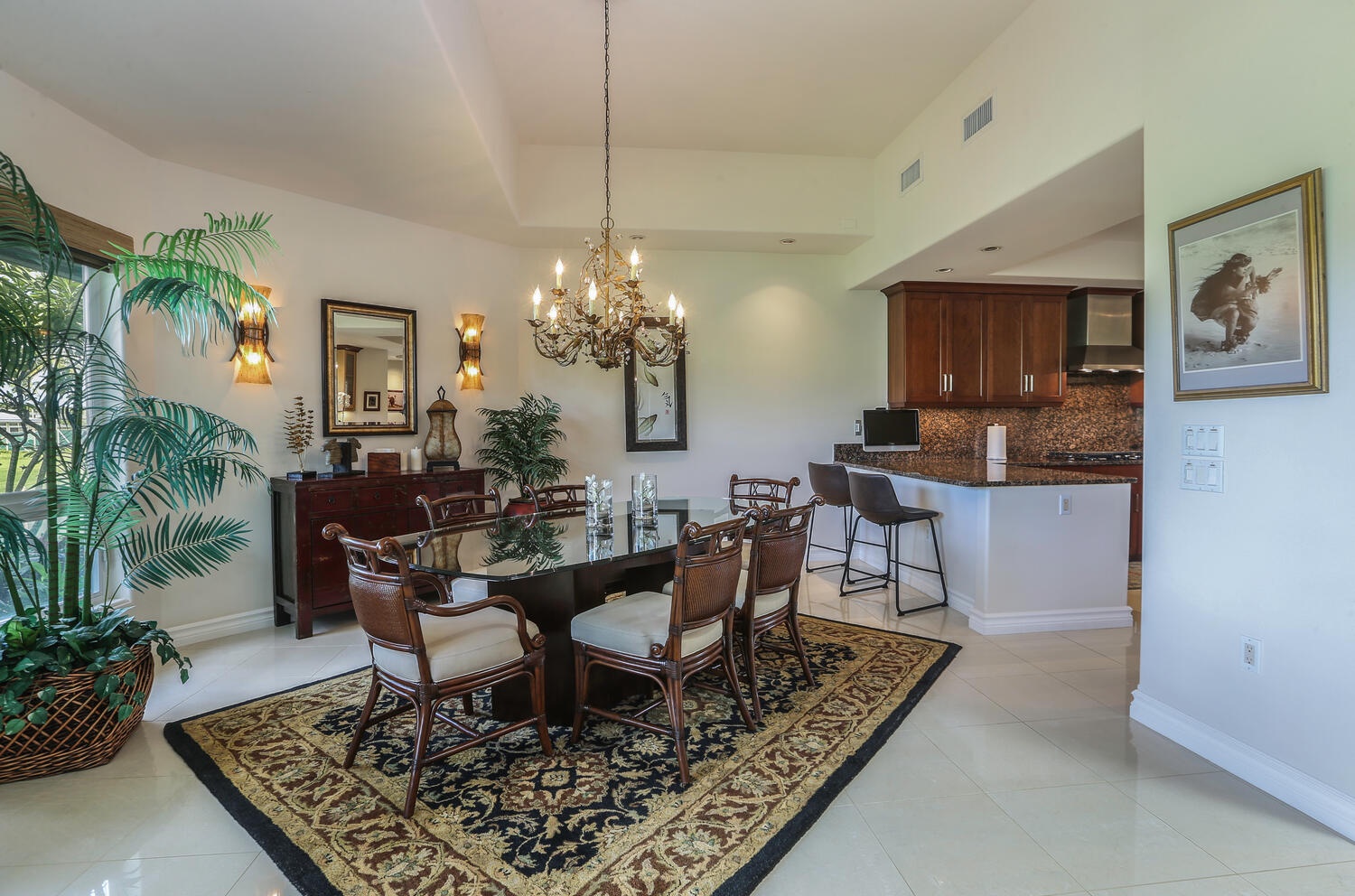 Princeville Vacation Rentals, Hale Moana - The formal dining area comfortably seats 6 and flows seamlessly into the kitchen