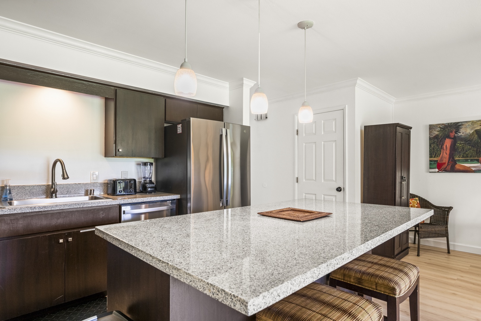 Kihei Vacation Rentals, Koa Resort 1B - Cushioned bar stools at the island offer a casual gathering space near the kitchen