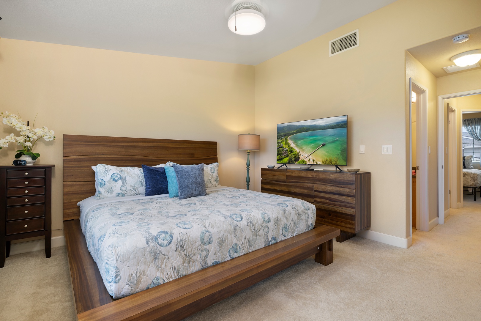 Kapolei Vacation Rentals, Hillside Villas 1498-3 - The primary bedroom has a king-sized bed, ensuite bathroom, TV and central AC.