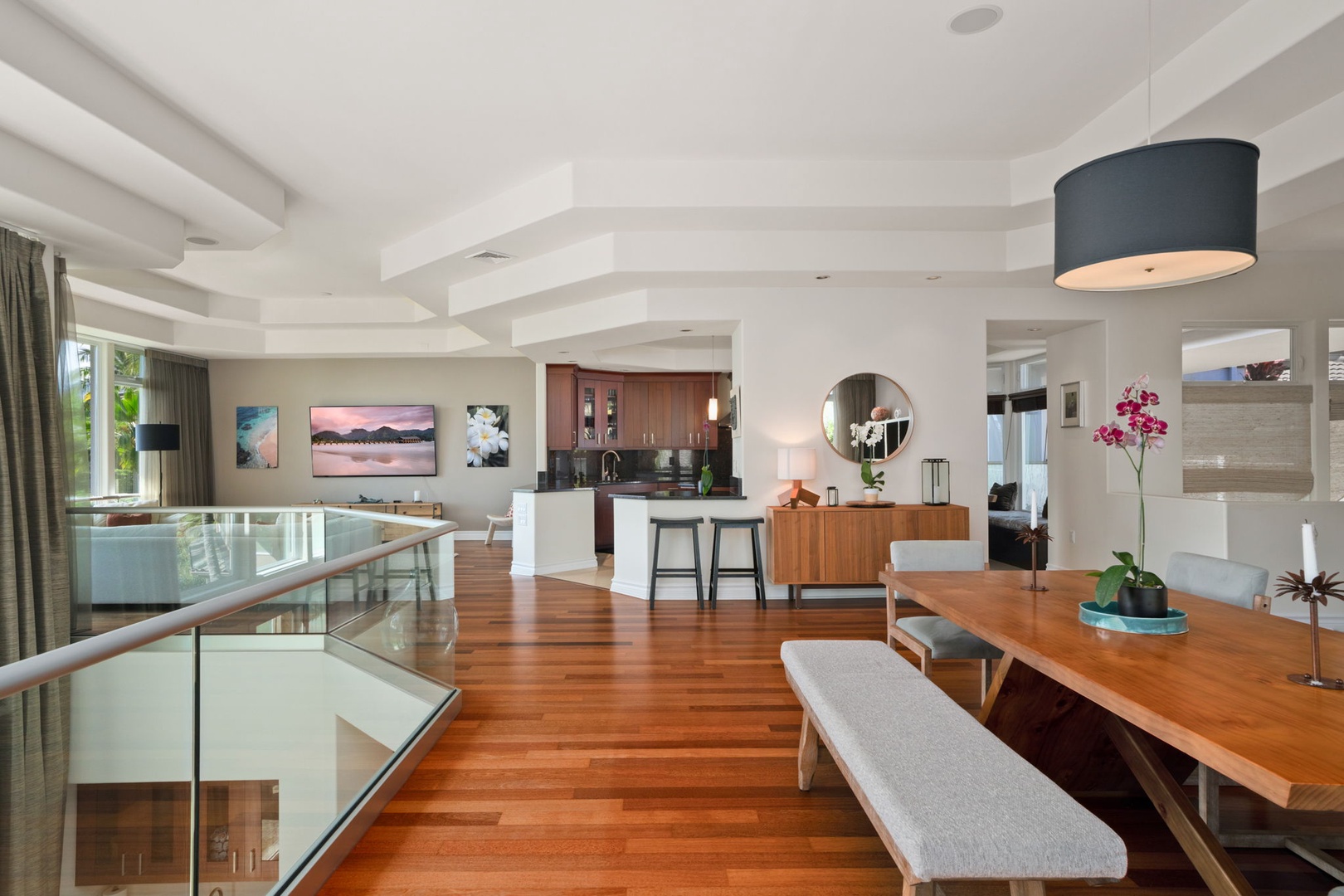 Princeville Vacation Rentals, Kaiulani #8 - Slide onto the long bench at the dining table, the whole main floor open around you.