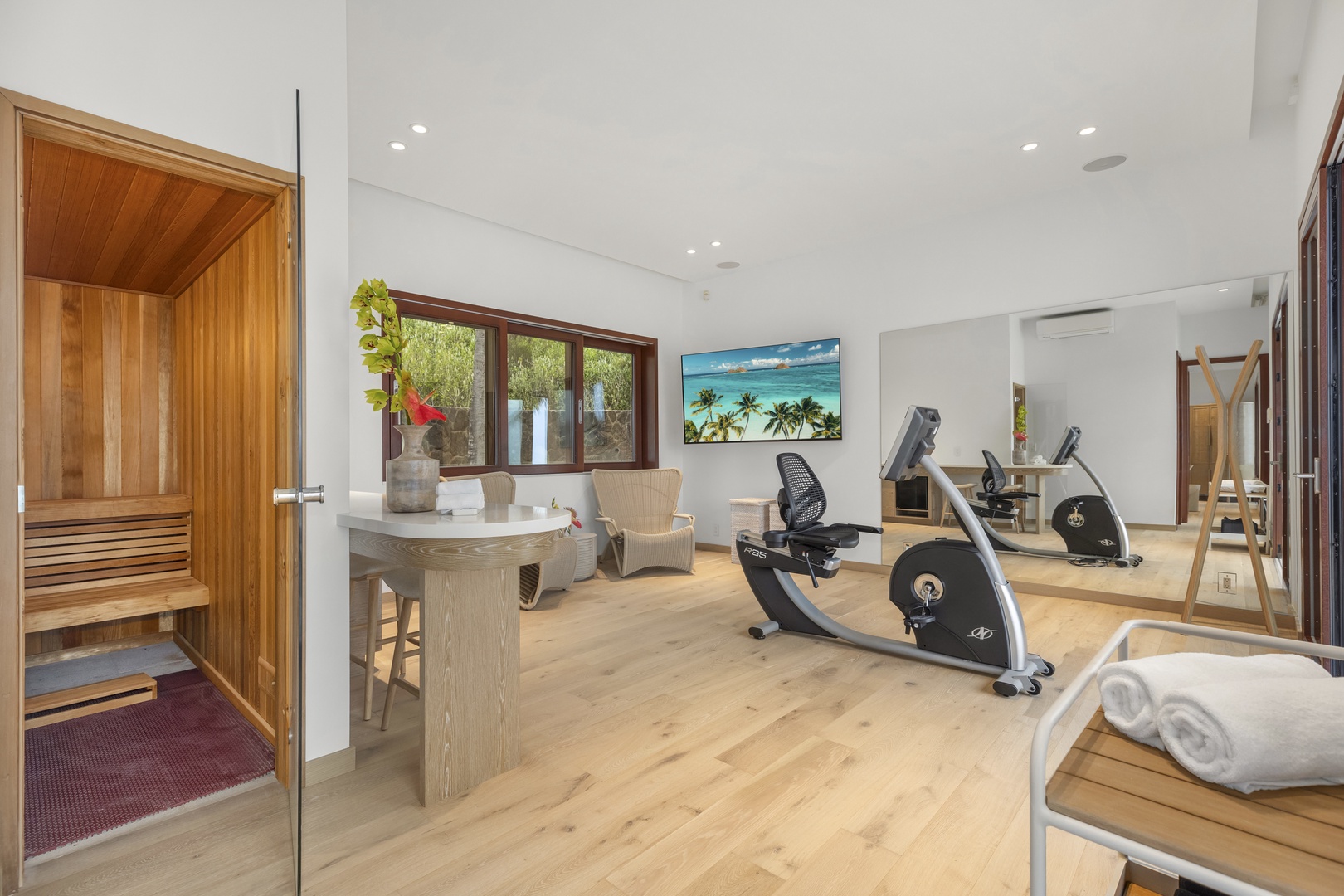 Kailua Vacation Rentals, Lanikai Hillside Estate - Gym/Yoga room designed for relaxation or exercise, with equipment available for rent.