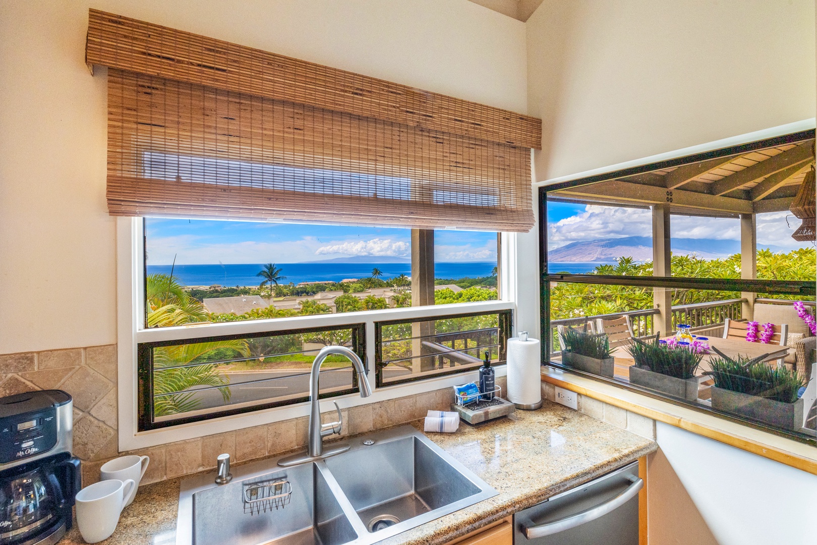 Kihei Vacation Rentals, Wailea Ekolu 1106 - Enjoy ocean views while cooking in the scenic kitchen at Wailea Ekolu 1106.