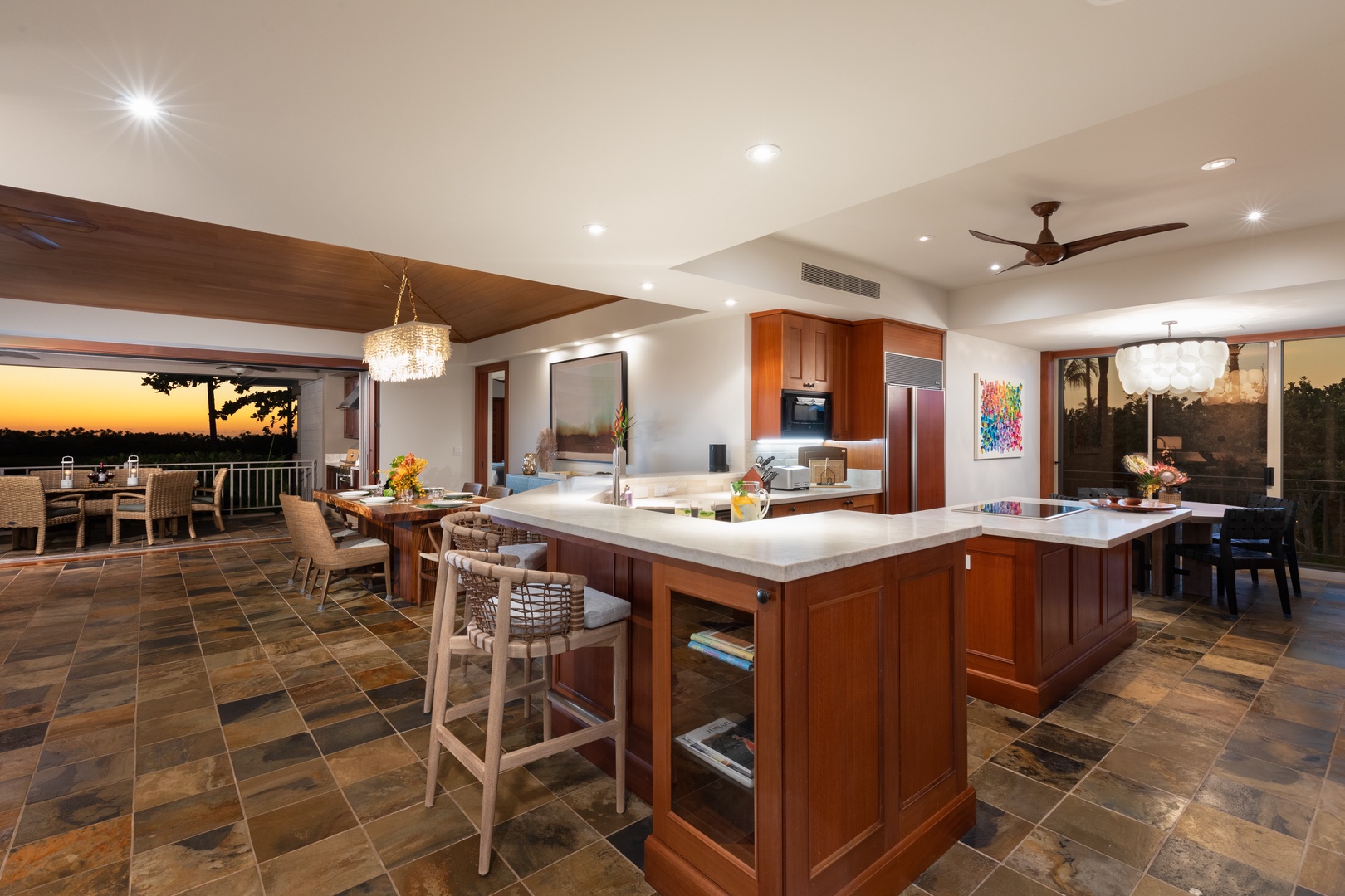 Kailua Kona Vacation Rentals, 3BD Waiulu Villa 111D at Hualalai Resort - Expansive kitchen with a central island, high-end appliances, and elegant finishes.