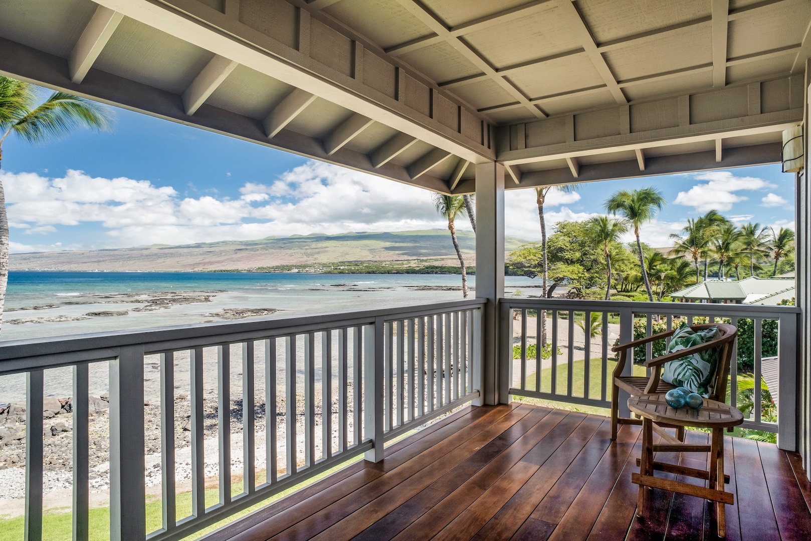 Kamuela Vacation Rentals, 3BD Estate Home at Puako Bay (10D) - Upstairs Primary Bedroom Lanai w/ Bistro Set and Comfy Love Seat to Enjoy the Magnificent Views