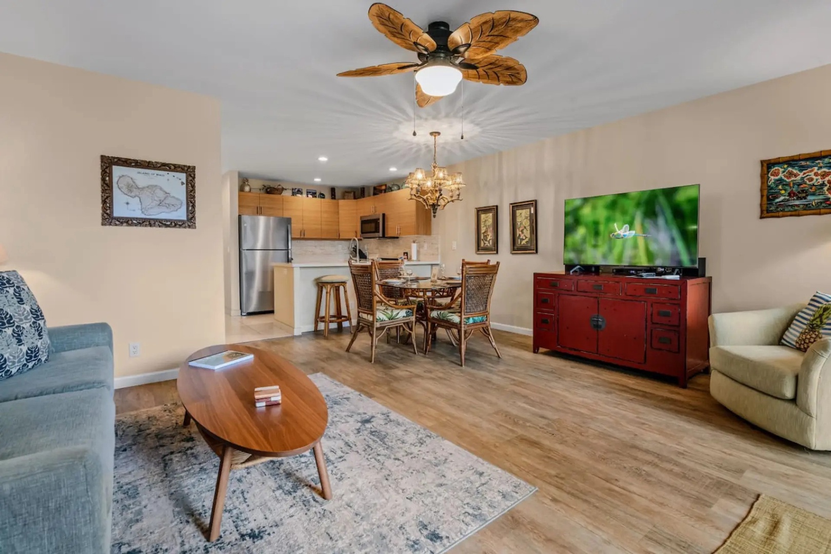 Kihei Vacation Rentals, Maui Kamaole E103 - Move easily between the kitchen, dining table, and sofa in an open layout built for the whole group.