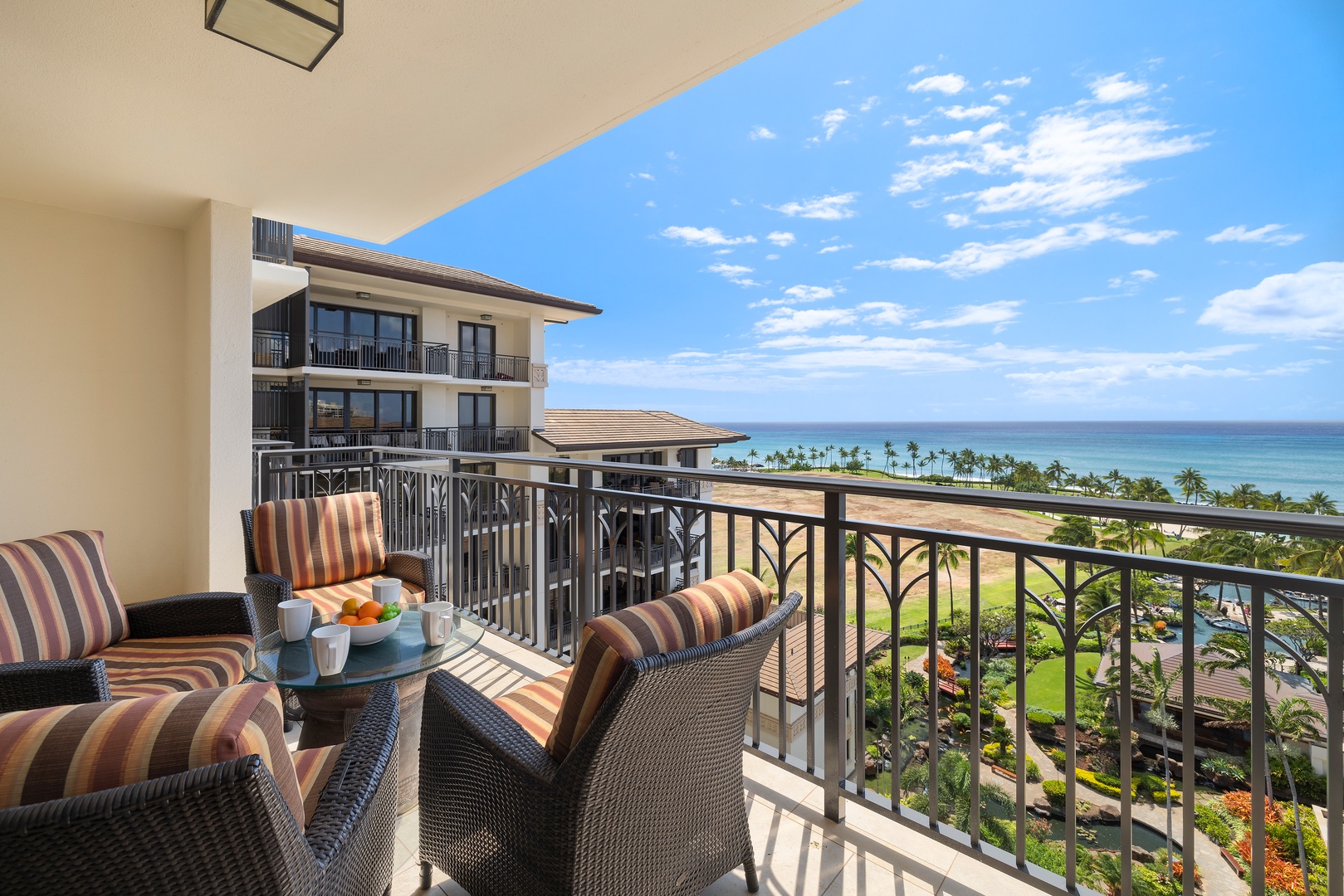 Kapolei Vacation Rentals, Ko Olina Beach Villas O1004 - Enjoy your morning coffee on the lanai.