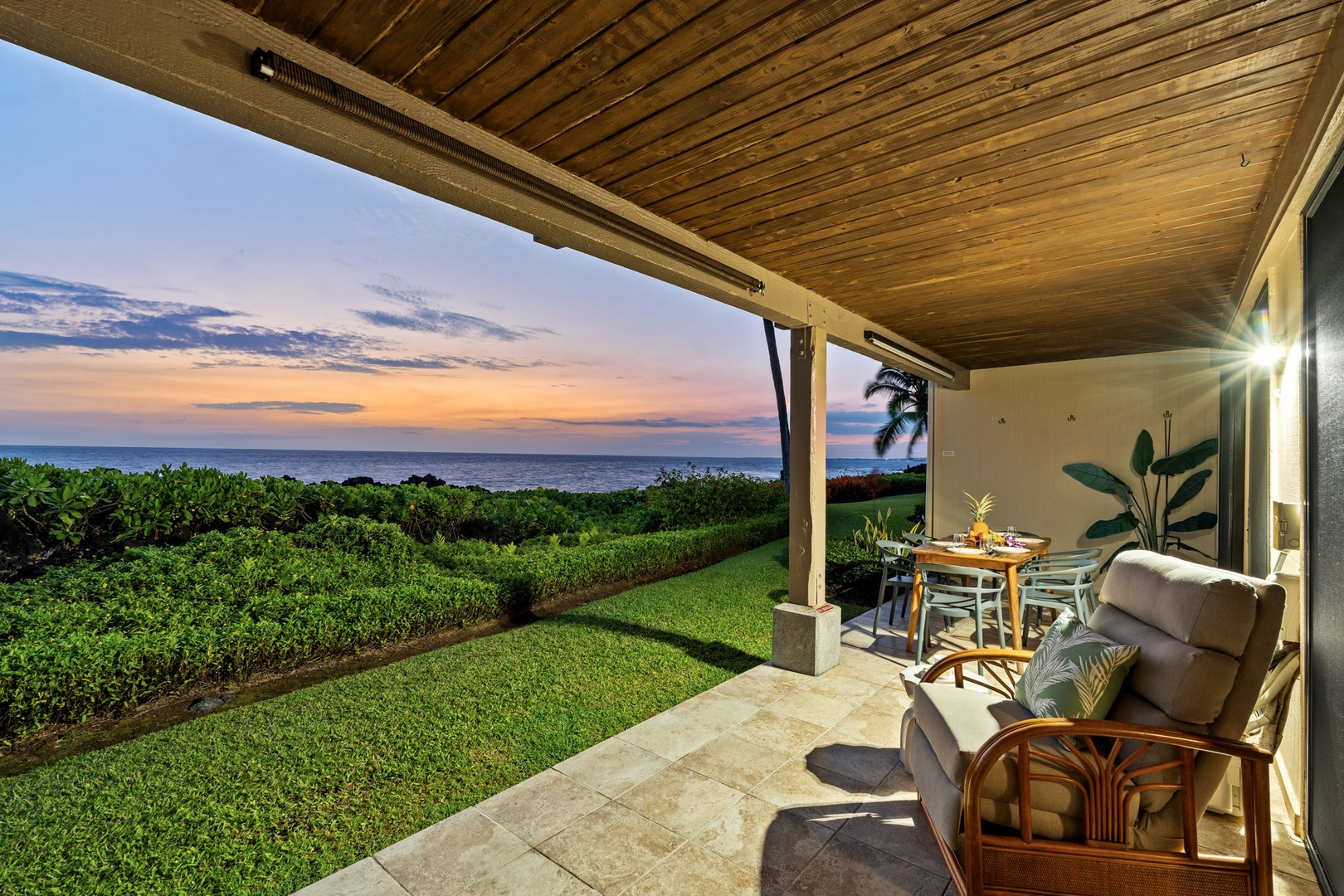 Kailua Kona Vacation Rentals, Keauhou Kona Surf & Racquet 1104 - Under the wood ceiling, the lanai holds the last of the light off the water.
