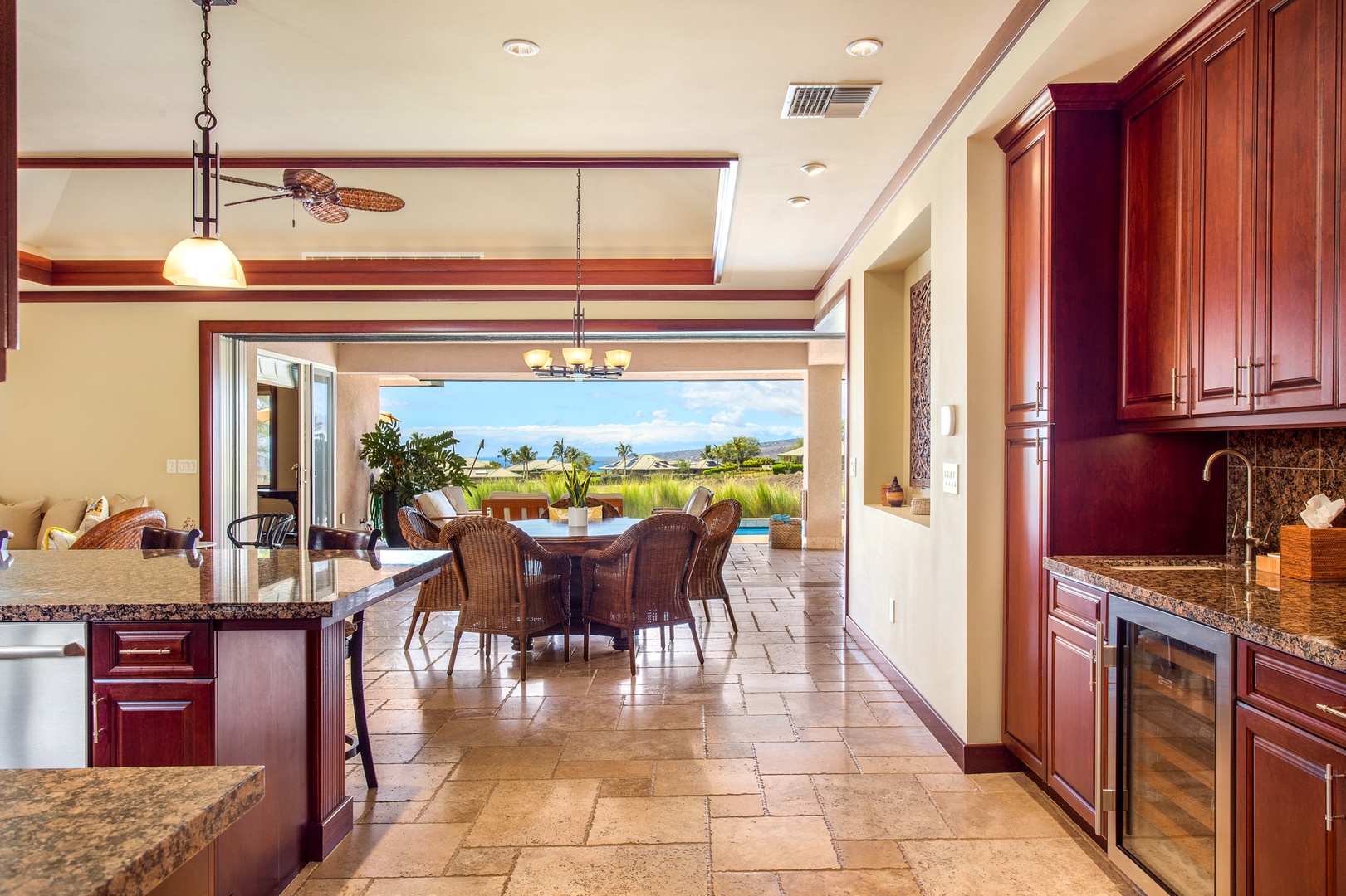 Kamuela Vacation Rentals, 3BD Wai'ula'ula Villa (312) at Mauna Kea Resort - Open-concept layout connects the dining area to the outdoor lanai — ideal for seamless island living.