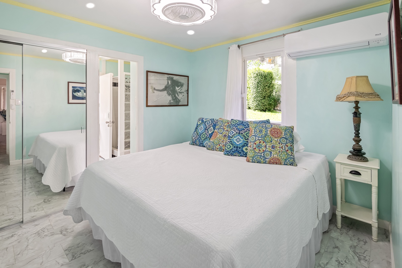 Hauula Vacation Rentals, Private Beach Paradise - A bedroom with its ensuite shower just through the doorway, everything close at hand.