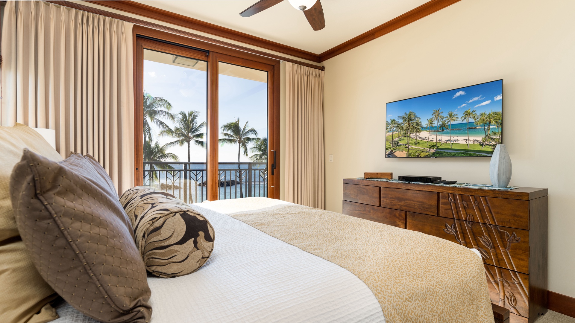 Kapolei Vacation Rentals, Ko Olina Beach Villas B309 - The primary guest bedroom with TV and the best views.