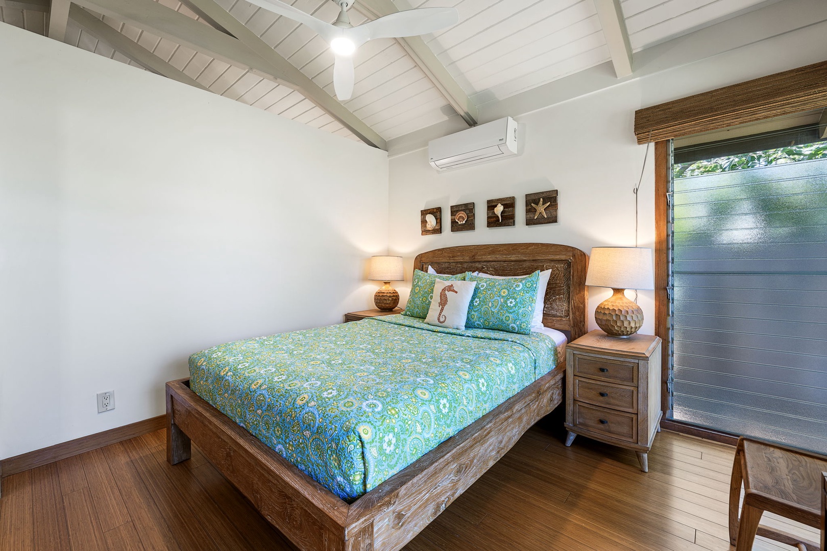 Kamuela Vacation Rentals, Island Time Retreat - This bedroom keeps it simple, wood floors and a garden view out the window.