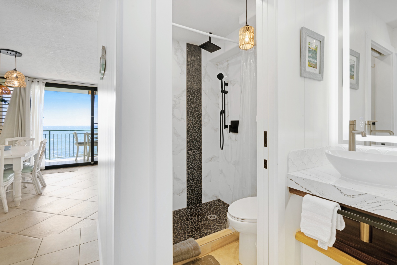 Kihei Vacation Rentals, Punahoa Beach 205 - Step out of the walk-in shower and the ocean is already waiting through the rooms beyond.