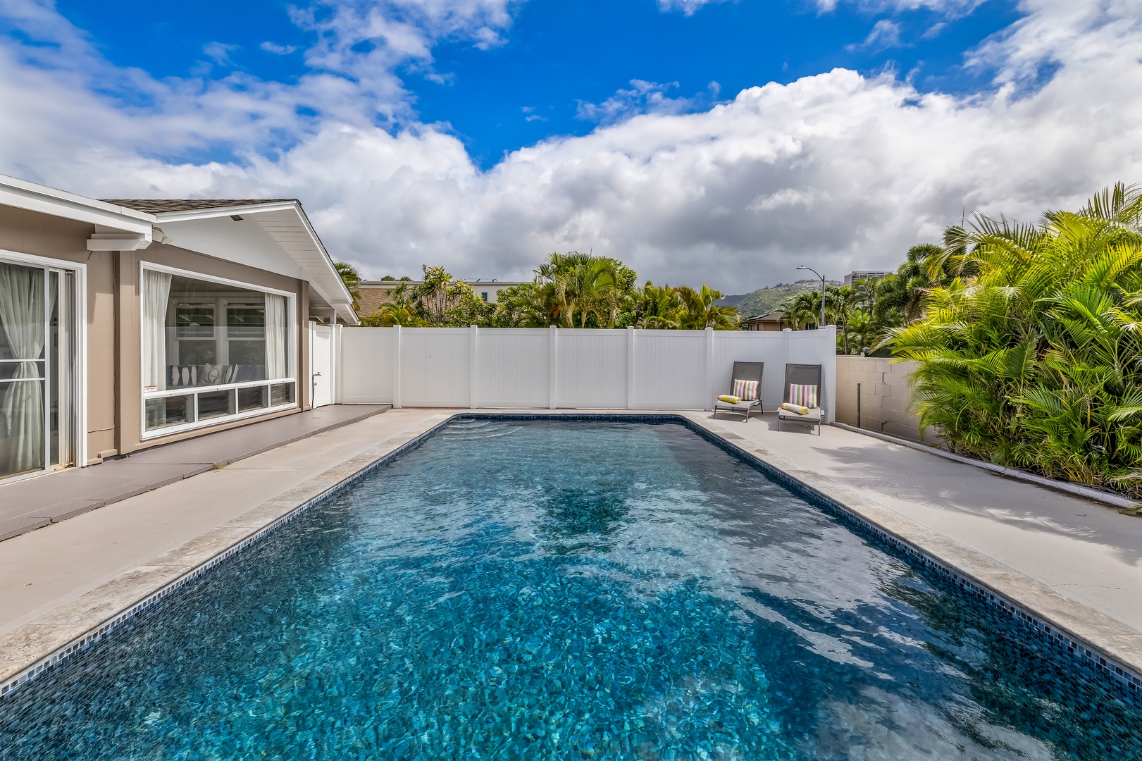 Honolulu Vacation Rentals, Kahala Cottage - Your pool has fencing all around creating privacy.