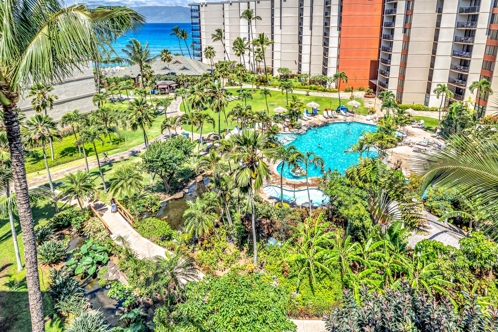 Lahaina Vacation Rentals, Kaanapali Shores 746 - Dive into the resort-style pool at Kaanapali Shores 746, nestled among lush tropical landscaping.
