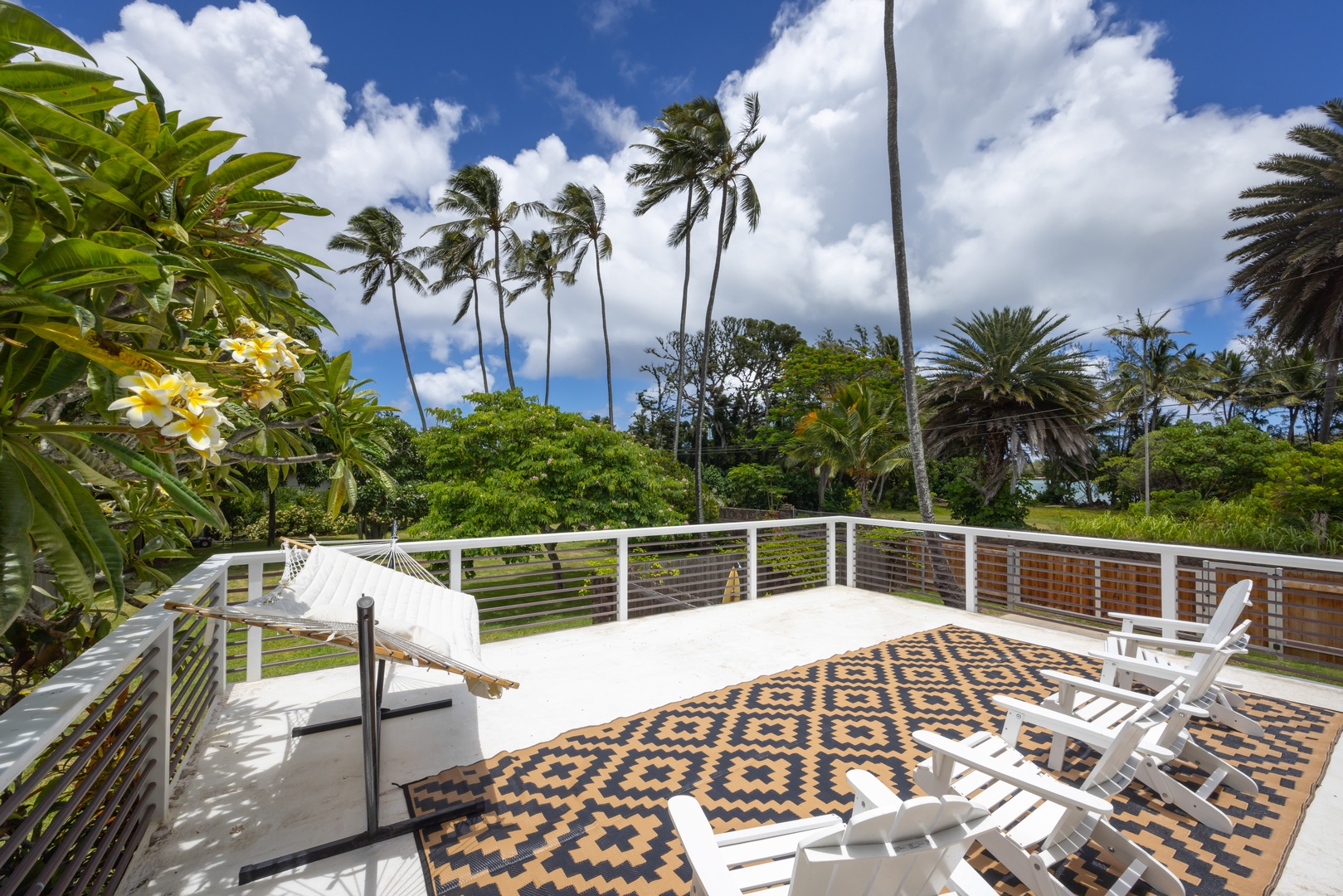 Kahuku Vacation Rentals, Hale Pellicano - Enjoy the tropical views on the lanai.