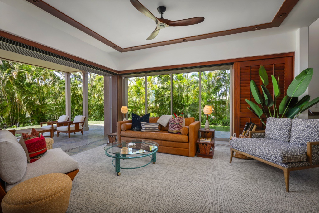 Kailua Kona Vacation Rentals, 3BD Ke Alaula Villa (217C) at Hualalai Resort - The ground floor sitting area has open sliders to lanai and wet bar with wine cooler.