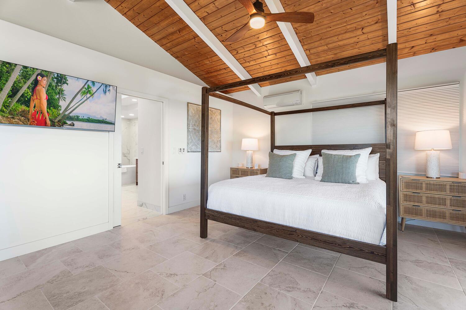 Kailua Kona Vacation Rentals, Ho'okipa Hale - Primary suite with a plush king bed clothed in fine linens—your restful retreat after island adventures.