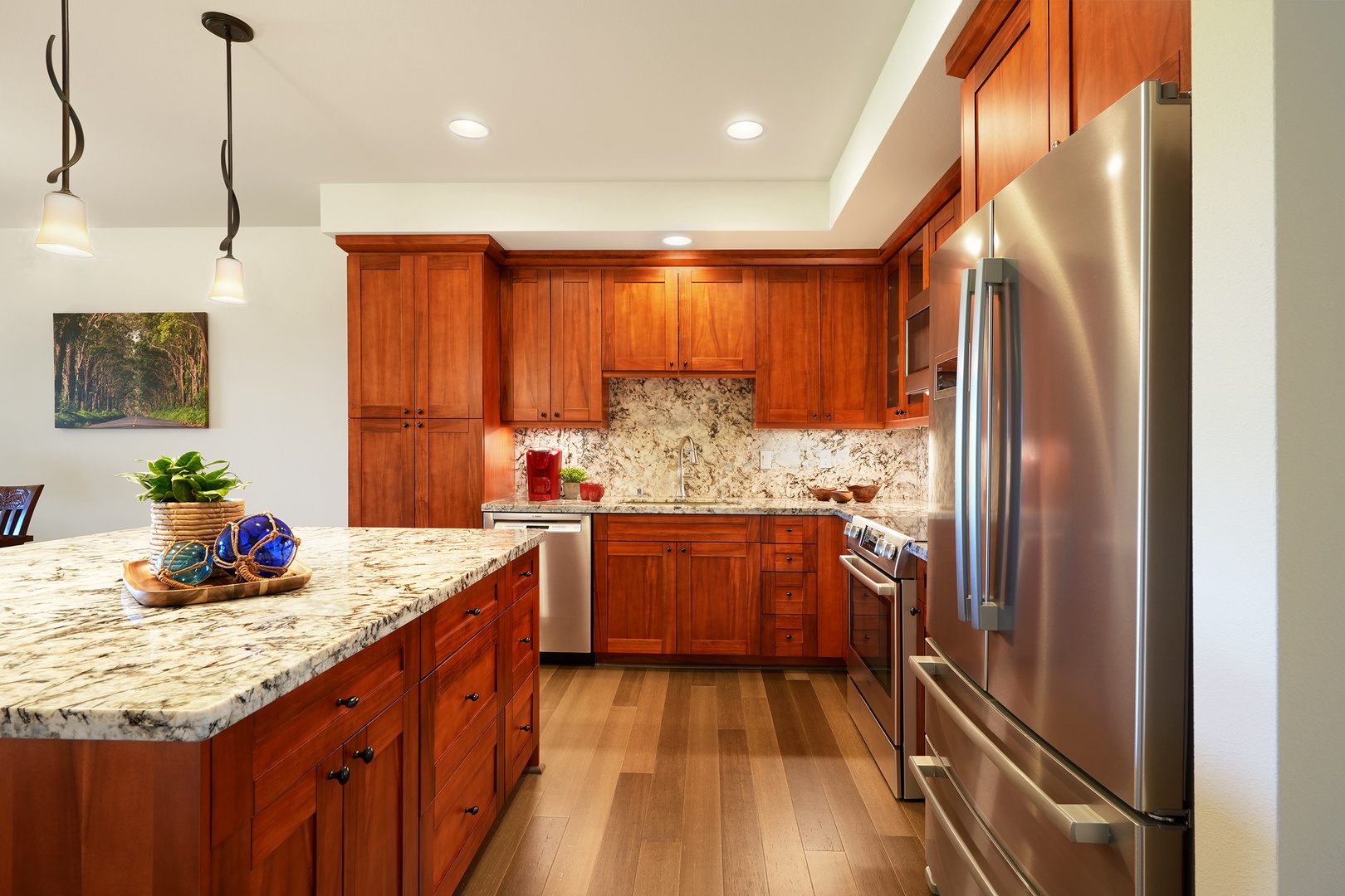 Koloa Vacation Rentals, Pili Mai 6J - Prepare your favorite meals in this beautifully appointed kitchen with rich cherry cabinets, granite countertops, and premium stainless steel appliances.