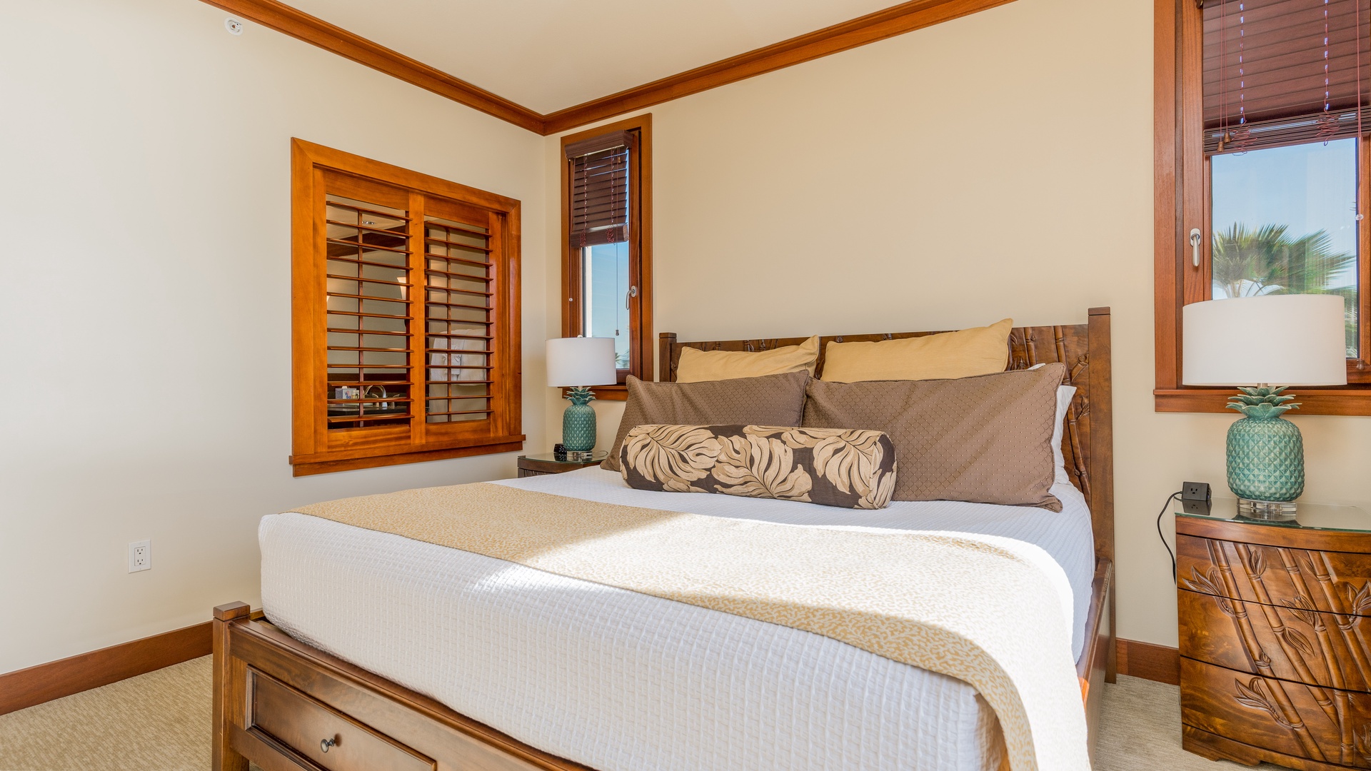Kapolei Vacation Rentals, Ko Olina Beach Villas B309 - The beautifully appointed primary guest bedroom.