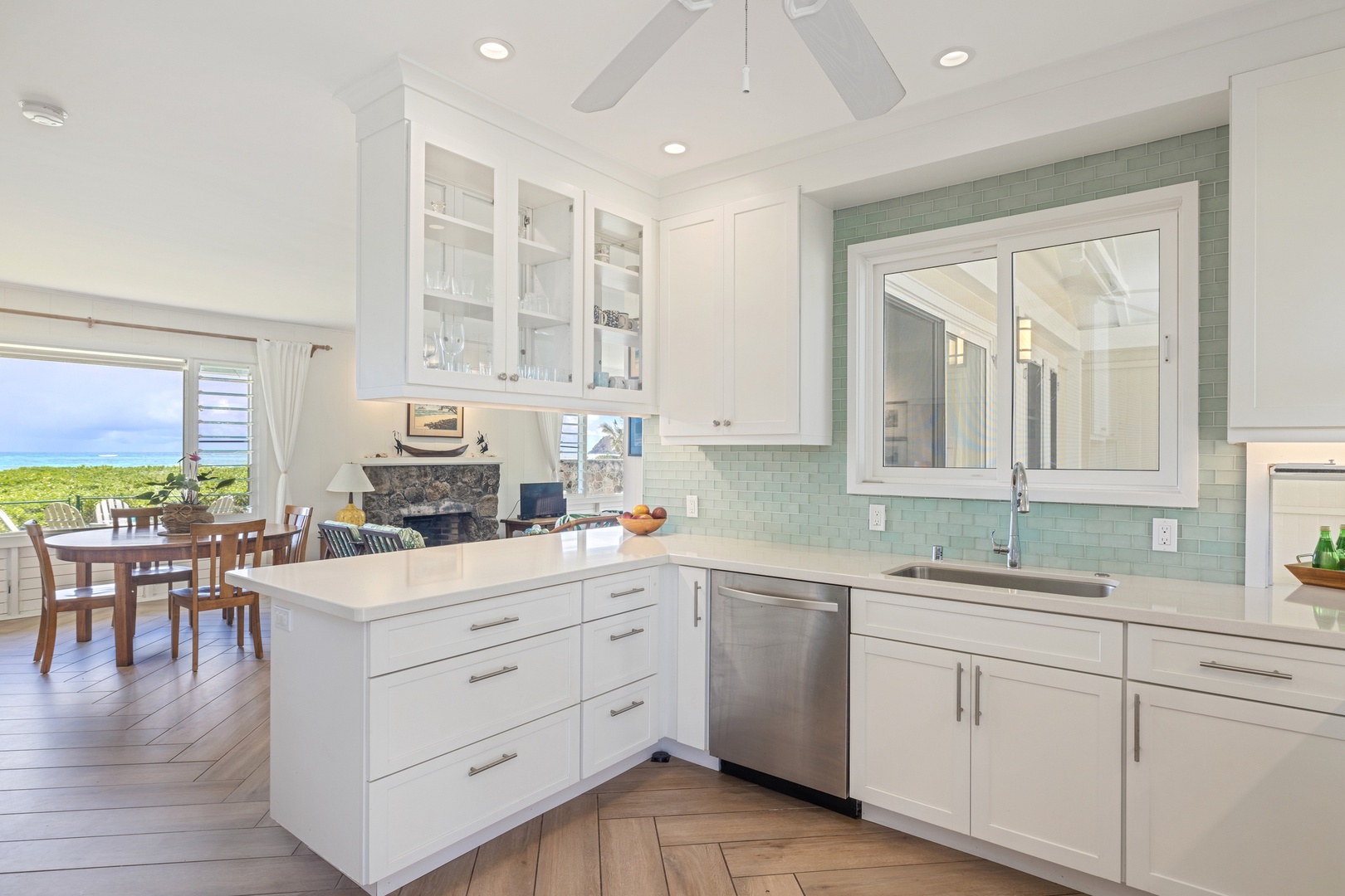 Kailua Vacation Rentals, Hale Moana Lanikai - The bright and airy kitchen features crisp white cabinetry and elegant backsplash.