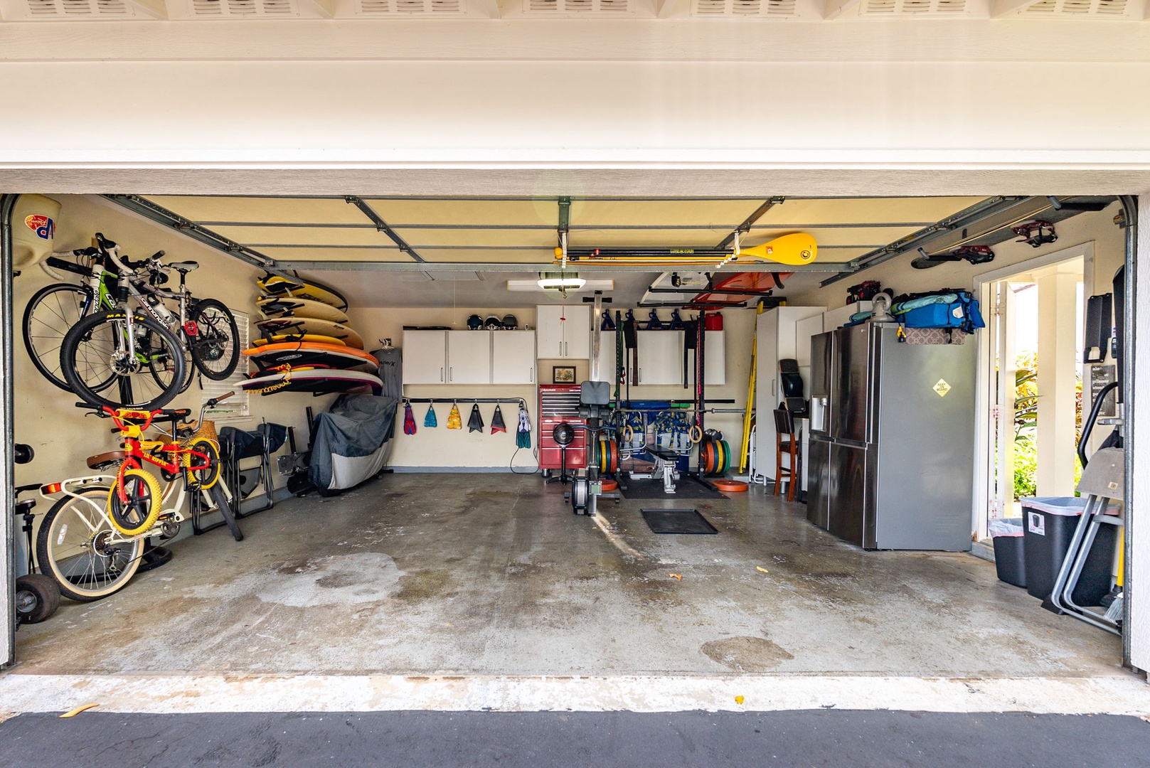 Kapolei Vacation Rentals, Coconut Plantation 1080-4 - Park in the garage and stow the bikes and beach gear out of the way.