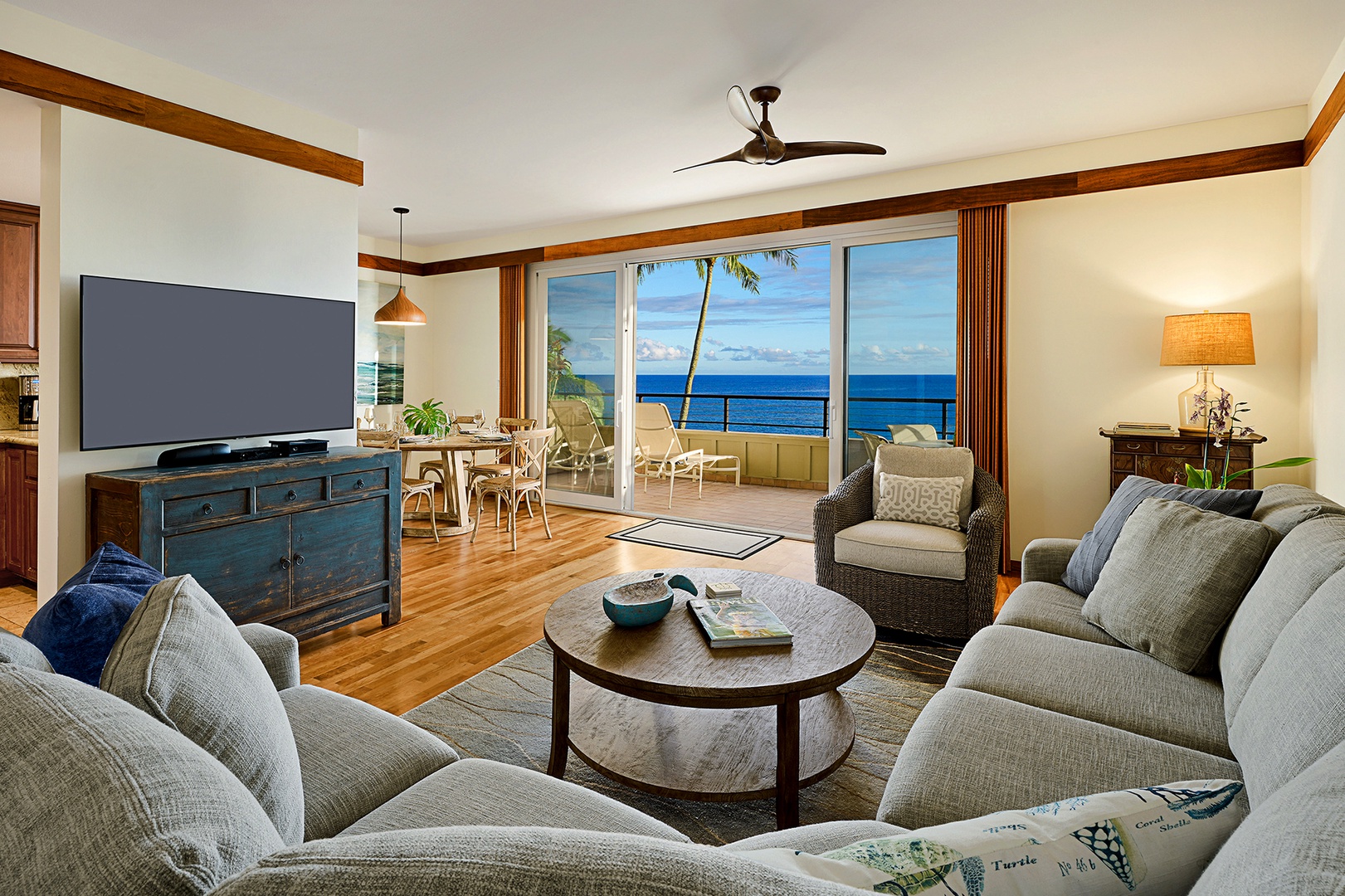 Koloa Vacation Rentals, Whalers Cove #133 - Unwind in the spacious living area with plush seating and panoramic ocean views.