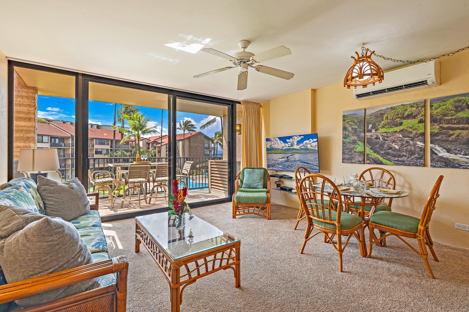 Lahaina Vacation Rentals, Papakea G-306 - The bright living area offers comfortable seating, a large TV, and direct access to the lanai with ocean views, perfect for relaxing or entertaining.