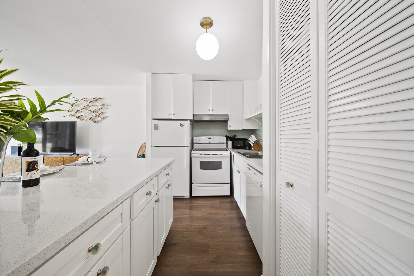 Kahuku Vacation Rentals, Pulelehua Kuilima Estates West #142 - Appliances all in white for a clean, modern look.