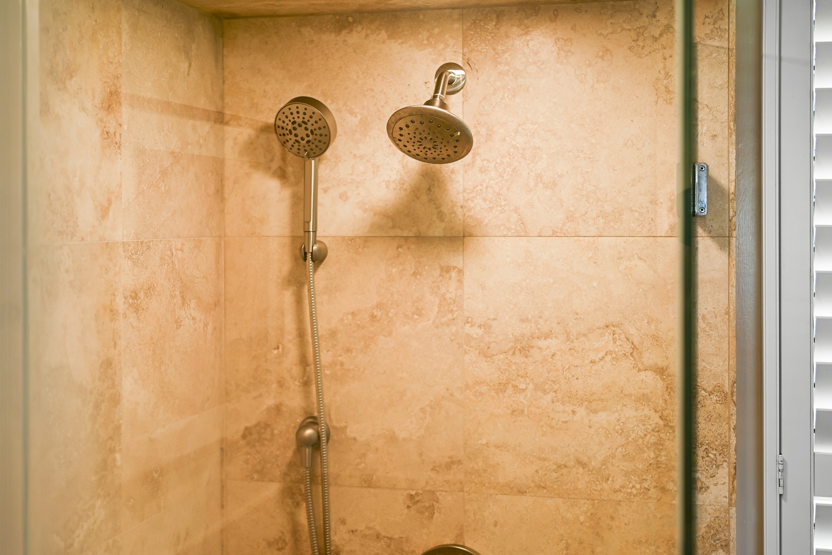 Honolulu Vacation Rentals, Kaimana Shores Getaway - The spacious walk-in shower features modern finishes and plenty of room to refresh after exploring Honolulu.