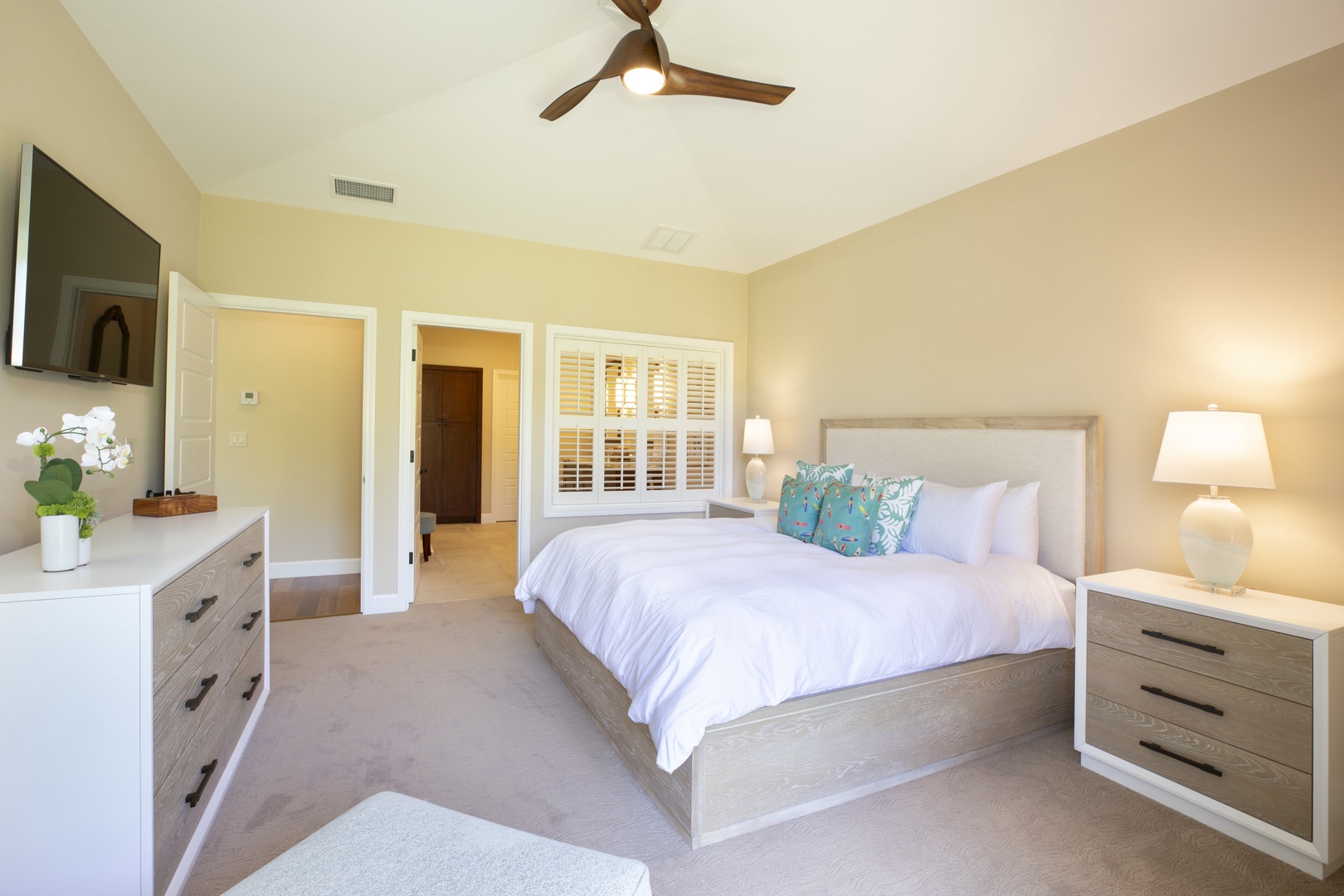 Kamuela Vacation Rentals, Mauna Lani KaMilo #503 - Retreat to this calming primary suite featuring its cozy ambience and soft island light—the perfect end to a beach-filled day.