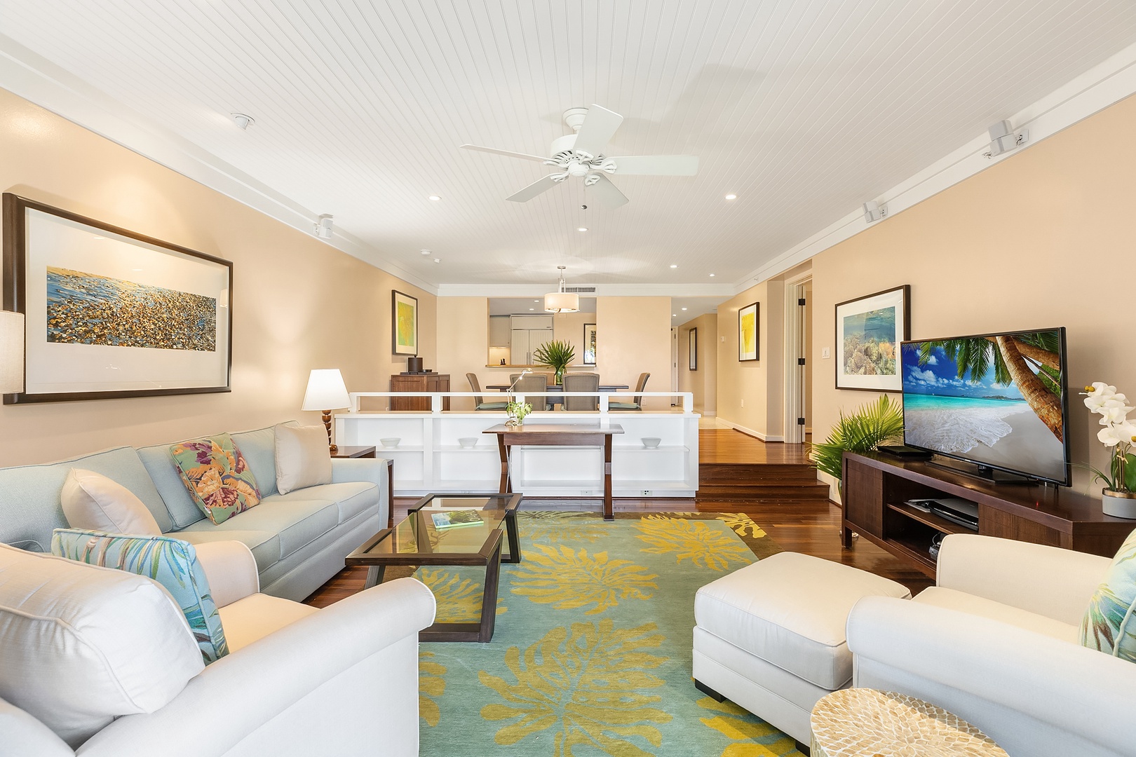 Kahuku Vacation Rentals, Turtle Bay Villas 112 - Dining area opens up into a large living space with comfortable seating.