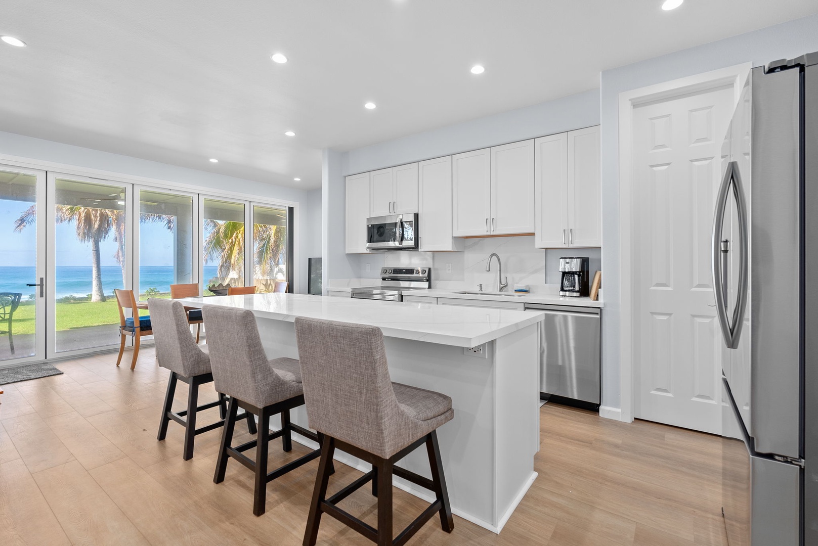 Waianae Vacation Rentals, Oceanfront Luxury Dream Estate - Lower-level kitchen with breakfast bar—ideal for small bites or morning coffee prep.