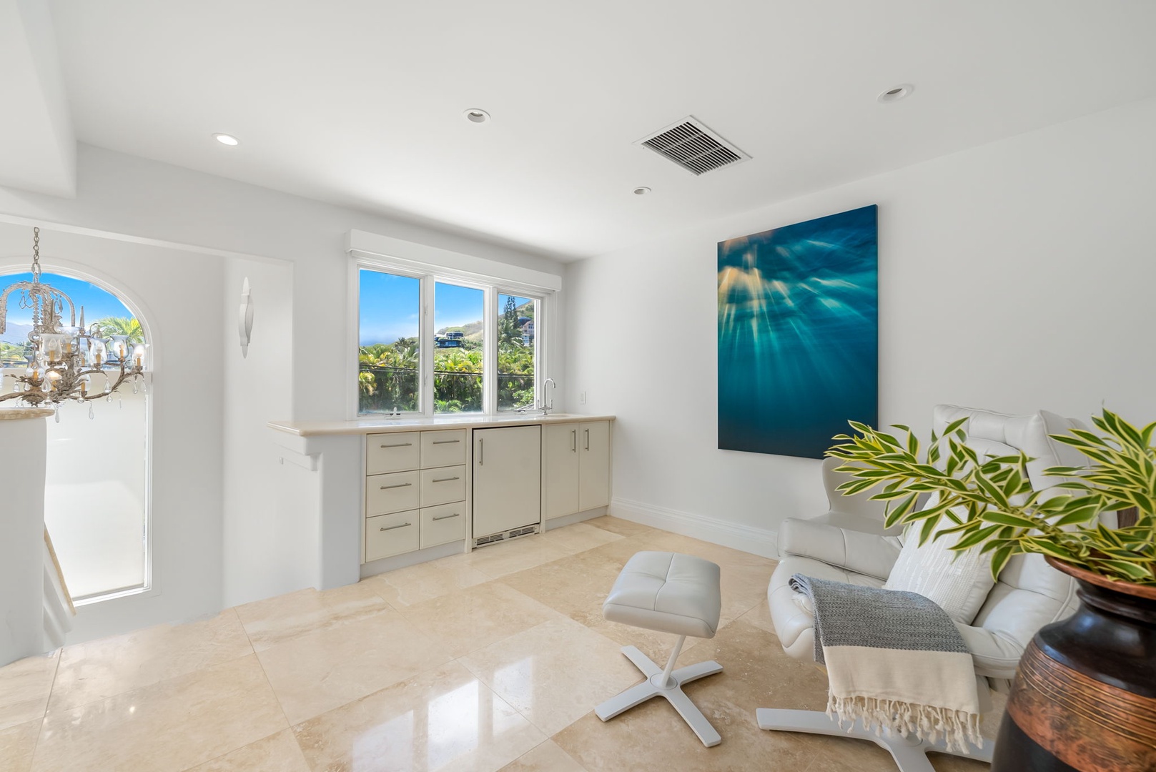 Kailua Vacation Rentals, Lanikai Sunrise Estate - A cozy upstairs lounge perfect for reading or a quiet conversation.