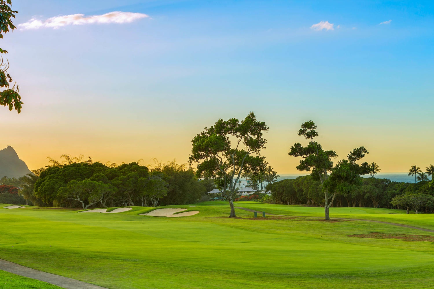 Princeville Vacation Rentals, Ohana Kamalani - Golf course at golden hour, just steps from the home, offering stunning scenery and leisure.