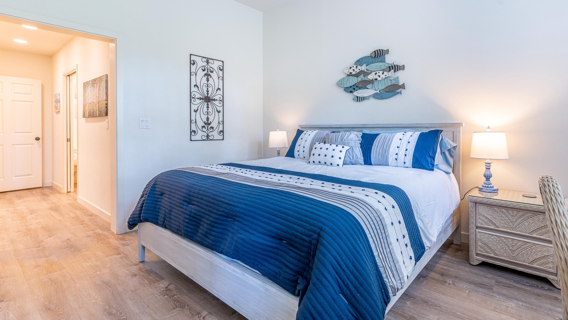 Kapolei Vacation Rentals, Coconut Plantation 1208-2 - The primary guest bedroom with a king size bed.