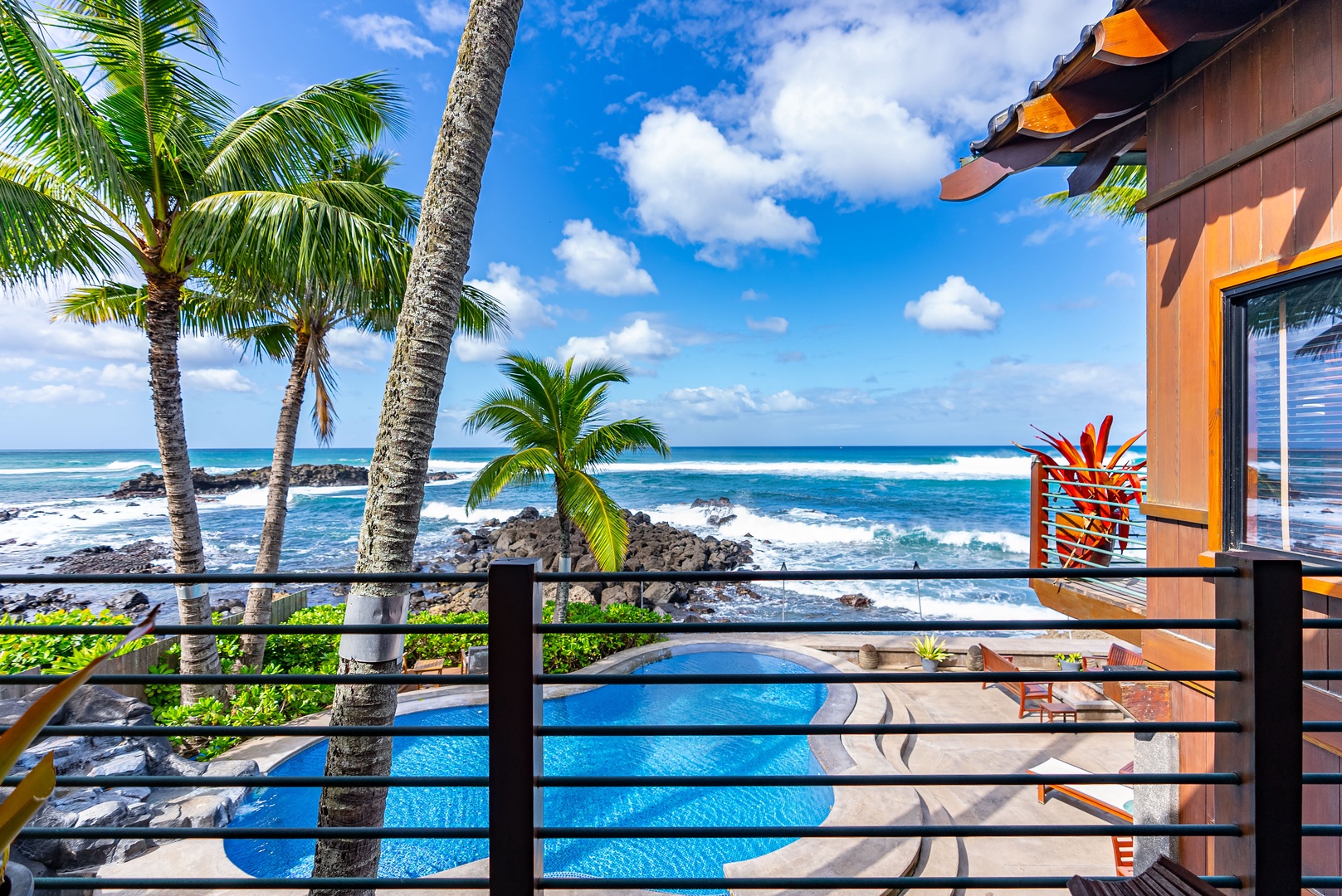 Haleiwa Vacation Rentals, Samurai House - Serene poolside area surrounded by lush greenery and ocean views.