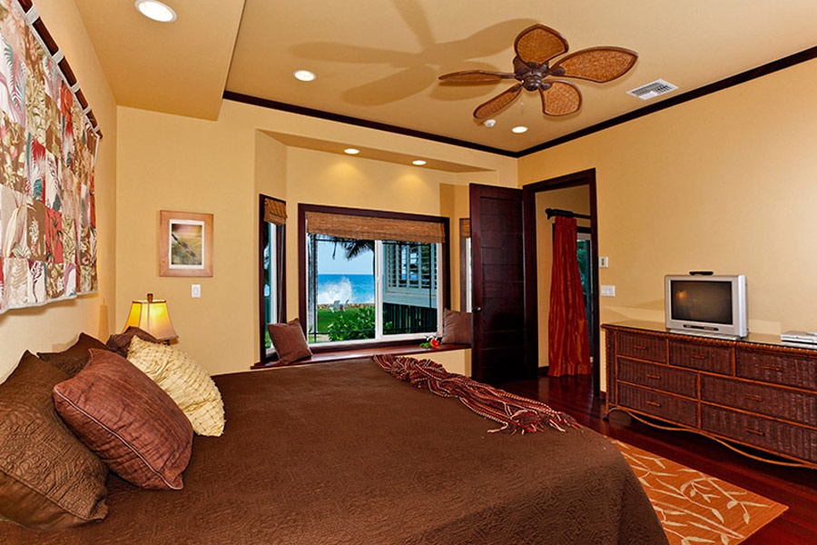 Waianae Vacation Rentals, Makaha Hale - Downstairs primary suite two, with king bed.