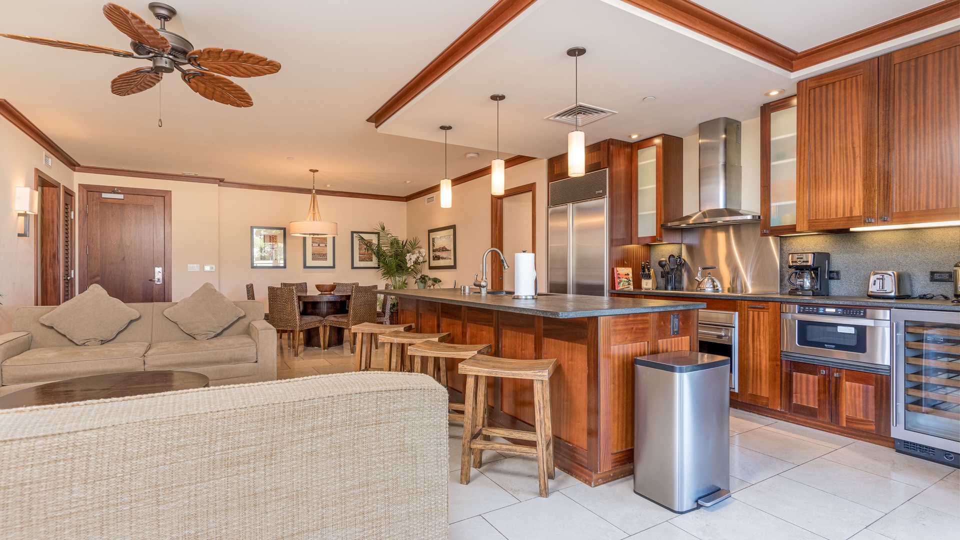 Kapolei Vacation Rentals, Ko Olina Beach Villas B202 - The living room, kitchen and dining are conveniently designed.