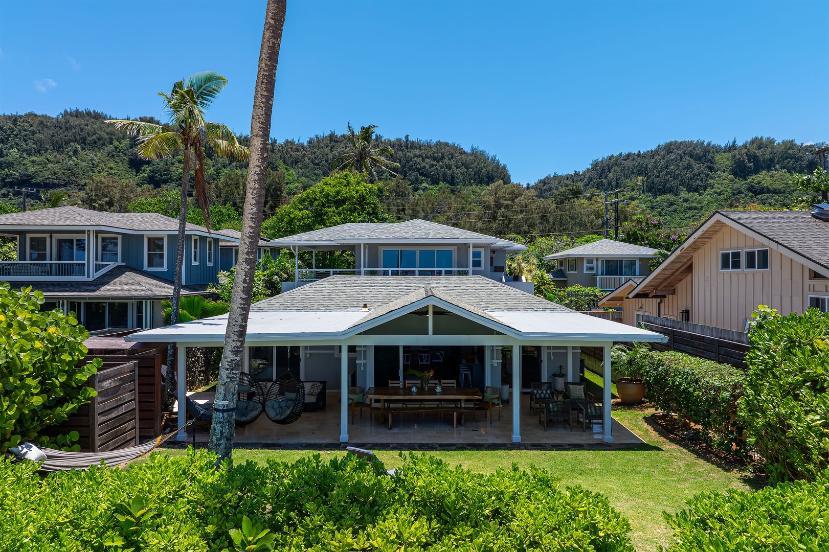 Haleiwa Vacation Rentals, Hale Nalu - A peaceful retreat steps from the beach and surrounded by lush green.
