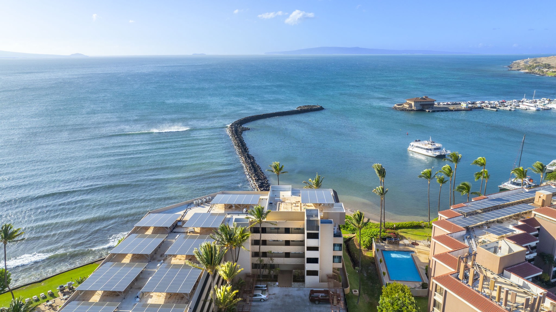 Wailuku Vacation Rentals, Milowai 310 - Open the gate from the pool deck and the ocean and lawn are right there.