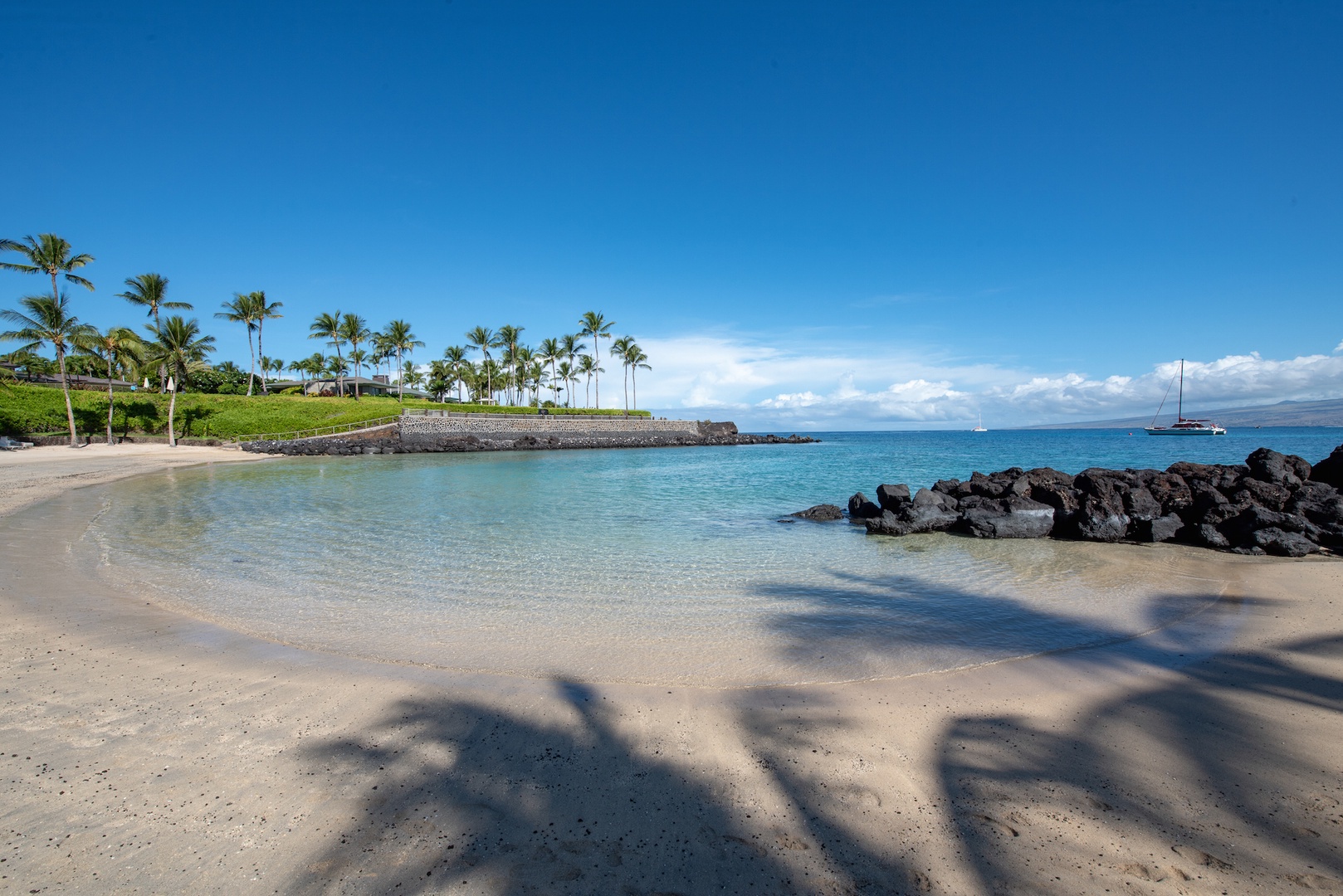 Kamuela Vacation Rentals, Kulalani 1701 at Mauna Lani - Morning Palm Trees Shadow the Sand at Mauna Lani Beach Club